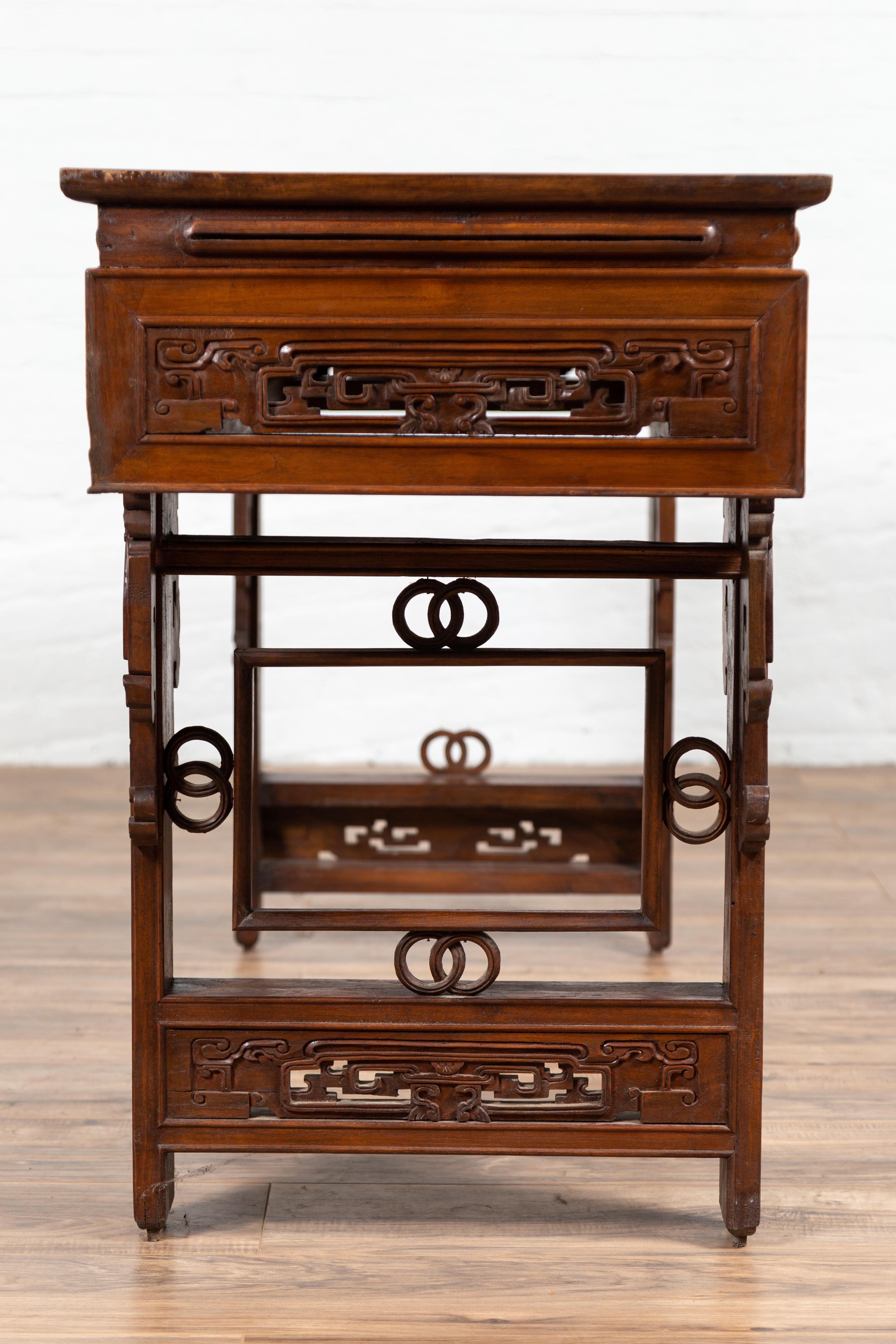 Hand-Carved Antique Chinese Altar Console Table with Overhang Top and Open Fretwork Scrolls For Sale