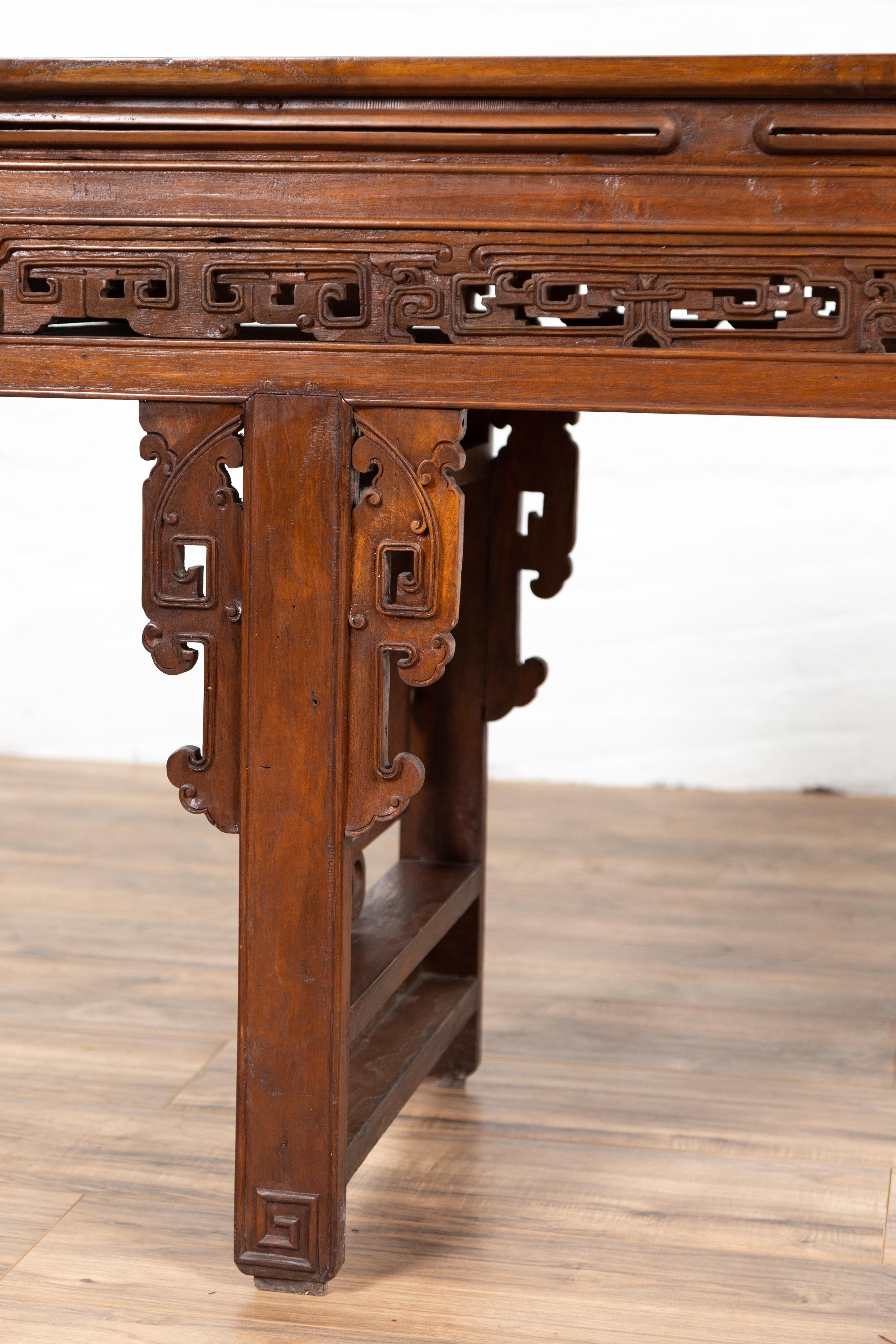 20th Century Antique Chinese Altar Console Table with Overhang Top and Open Fretwork Scrolls For Sale