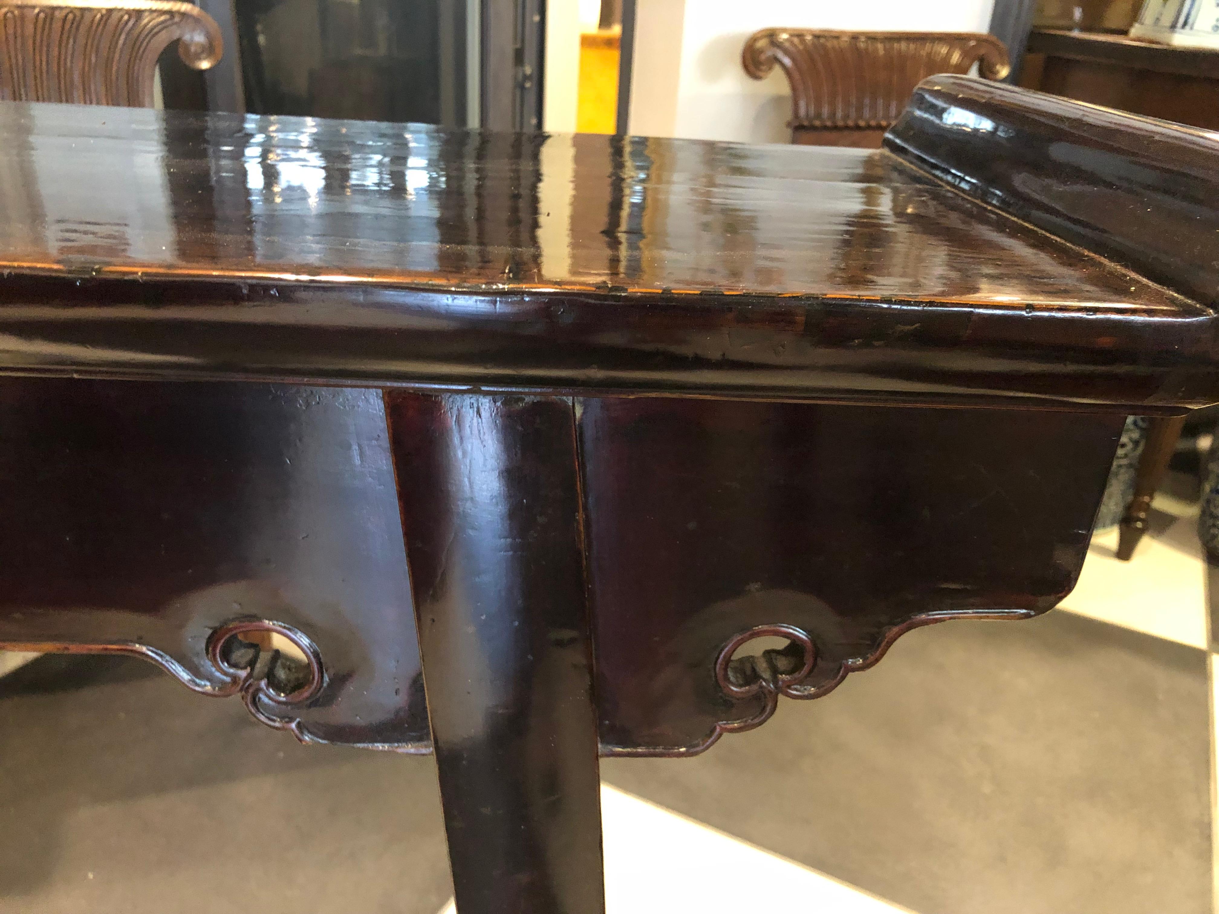 This black lacquered alter table has been restored to its former glory! Having two legs cloud Front Design and two secret drawers to the sides. Excellent condition from Shanxi Provence, China, late 18th century - early 19th century.