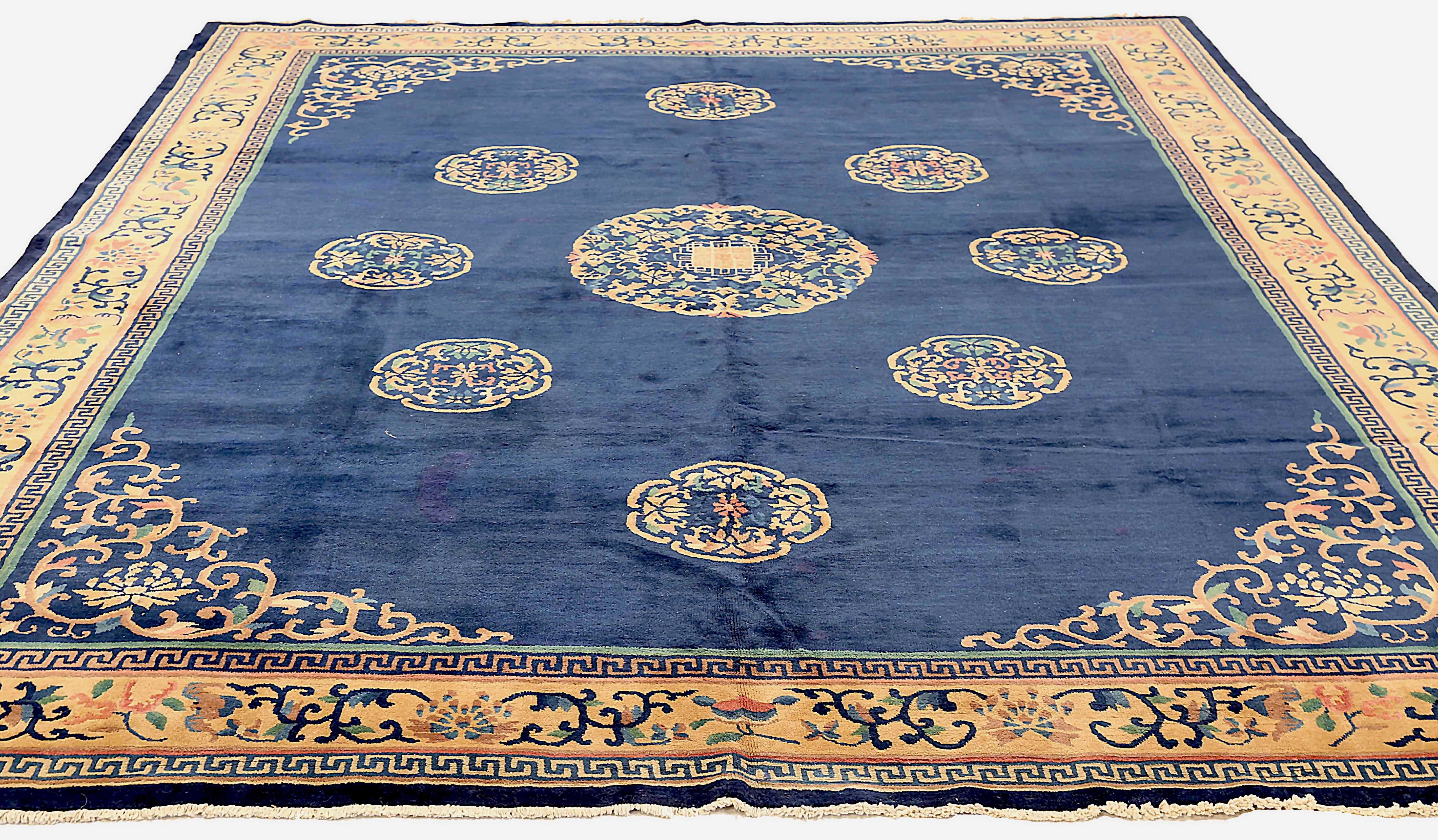 Antique Chinese area rug handwoven from the finest sheep’s wool. It’s colored with all-natural vegetable dyes that are safe for humans and pets. It’s a traditional China design handwoven by expert artisans. It’s a lovely area rug that can be