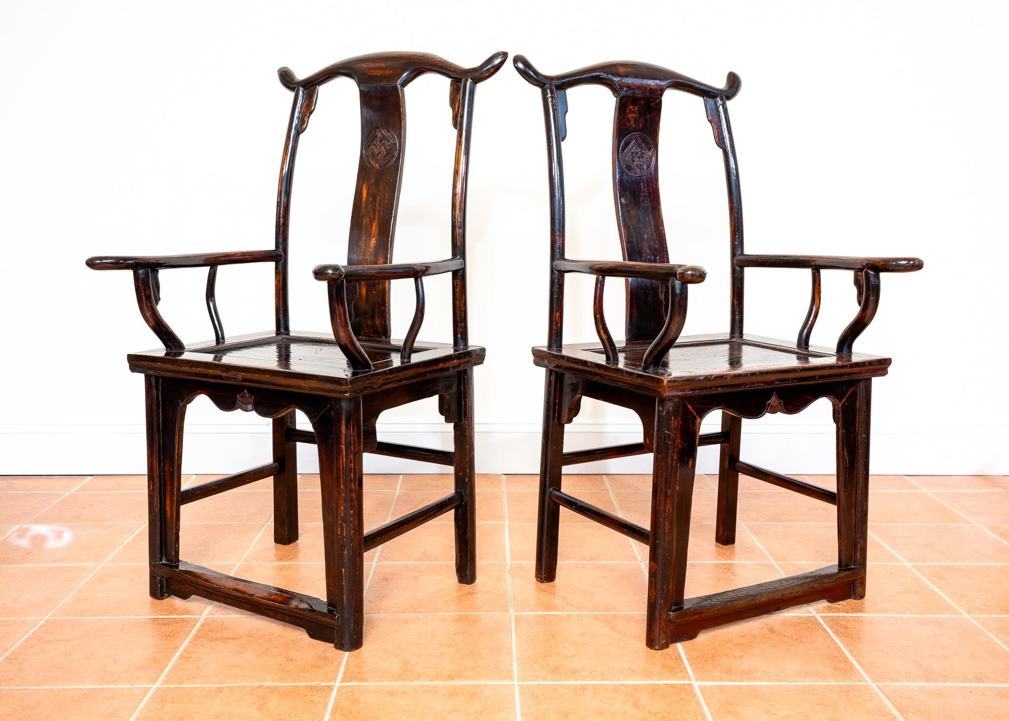 A stunning pair of fine antique lacquered Chinese armchairs in wonderful condition. Impressively sized and dripping with quality, this beautiful pair will add stunning bygone Oriental style and exquisite cultured grandeur to any setting.

Most
