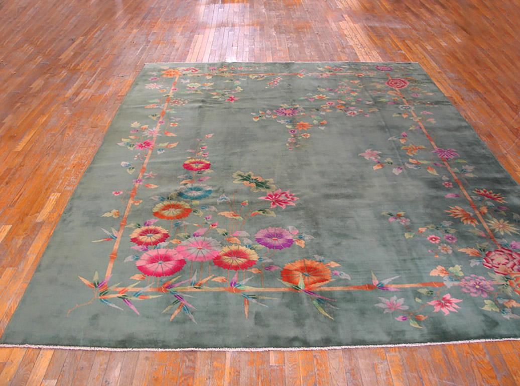 1920s Chinese Art Deco Carpet with a green background.
( 8'10