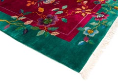 Antique Chinese Art Deco Floral Design Rug in Red, Green, Yellow, and Blue Wool