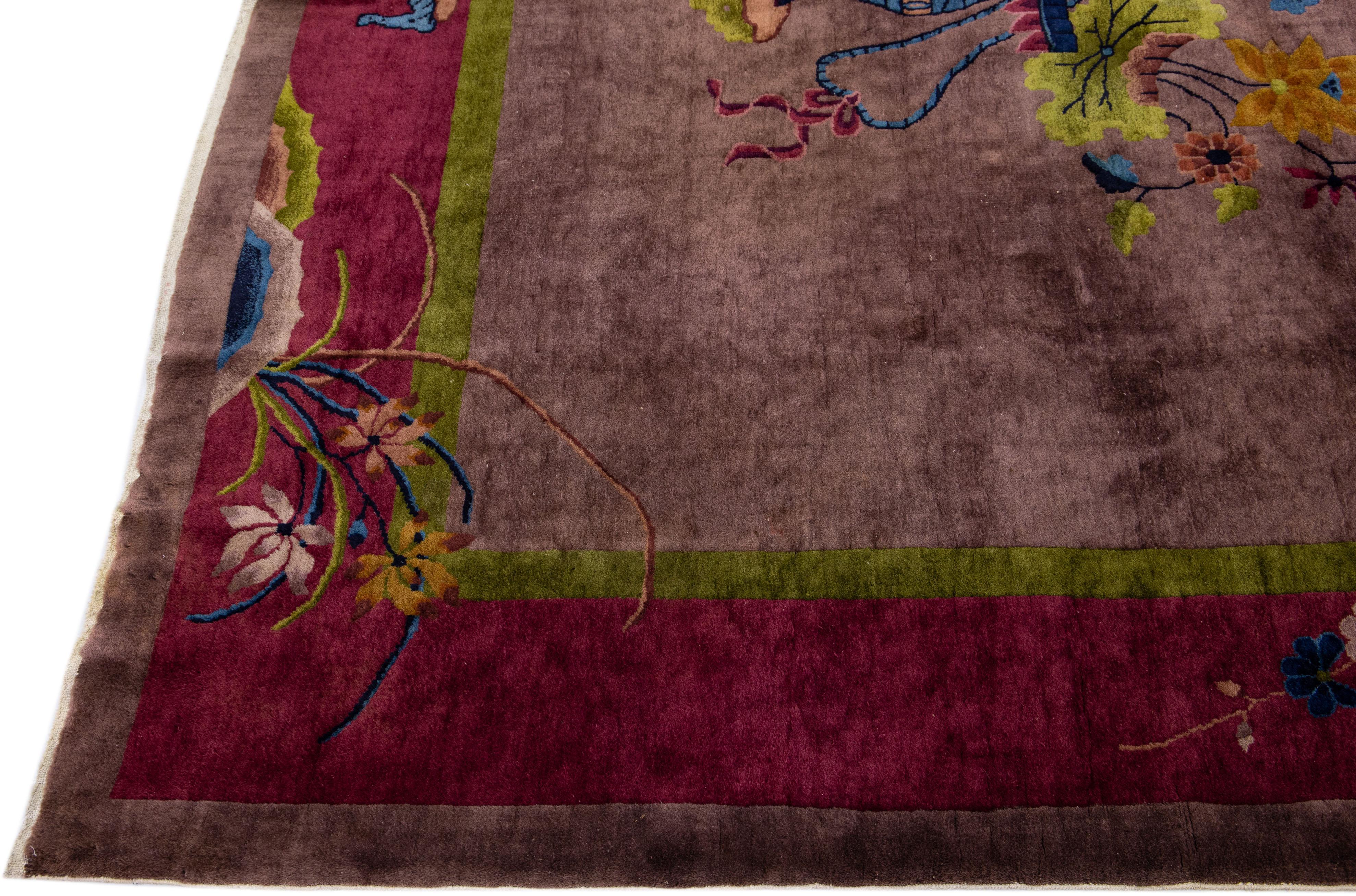 Antique Chinese Art Deco Handmade Burgundy Wool Rug with Floral Motif In Excellent Condition For Sale In Norwalk, CT
