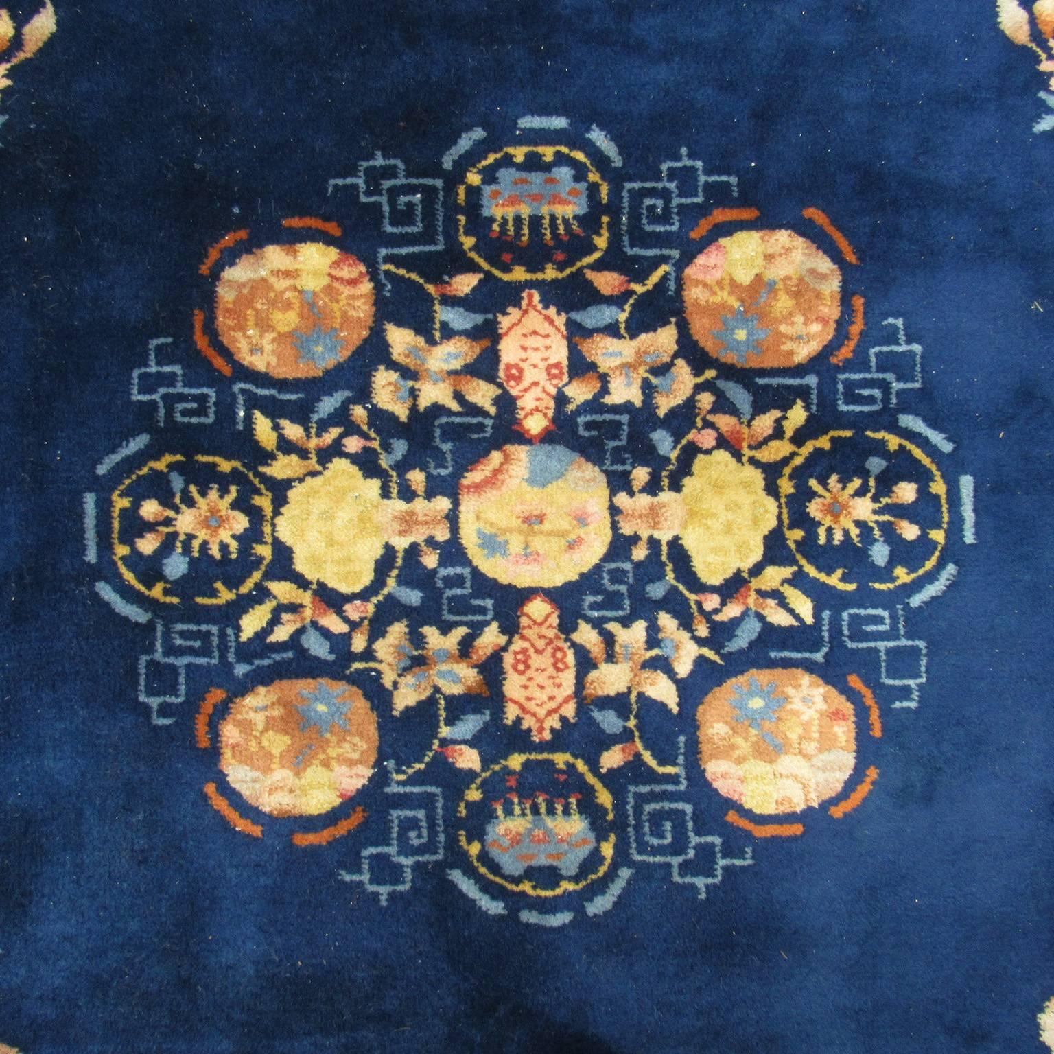 Antique Chinese Nichols Oriental carpet of blue ground with floral motif and two tone border. 11 feet 4 inches x 8 feet 10 inches and in absolutely terrific condition.
See the article below.



This article is a reprint scanned in from a