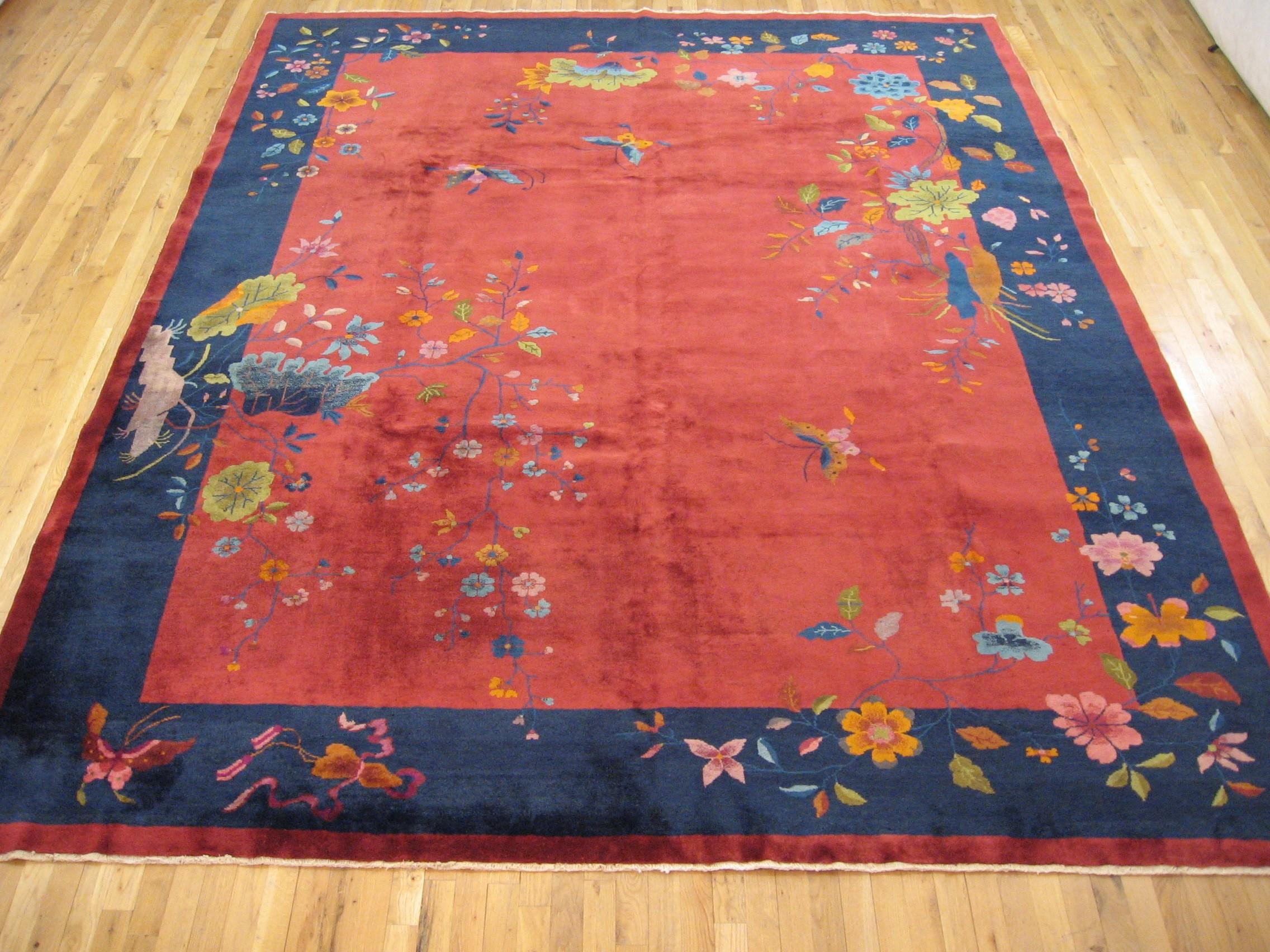 Antique Chinese Art deco rug, Room size, circa 1920

A one-of-a-kind antique Chinese Art deco oriental carpet, hand-knotted with medium thickness wool pile. This beautiful hand-knotted rug features art deco and chinese motifs on a large red open