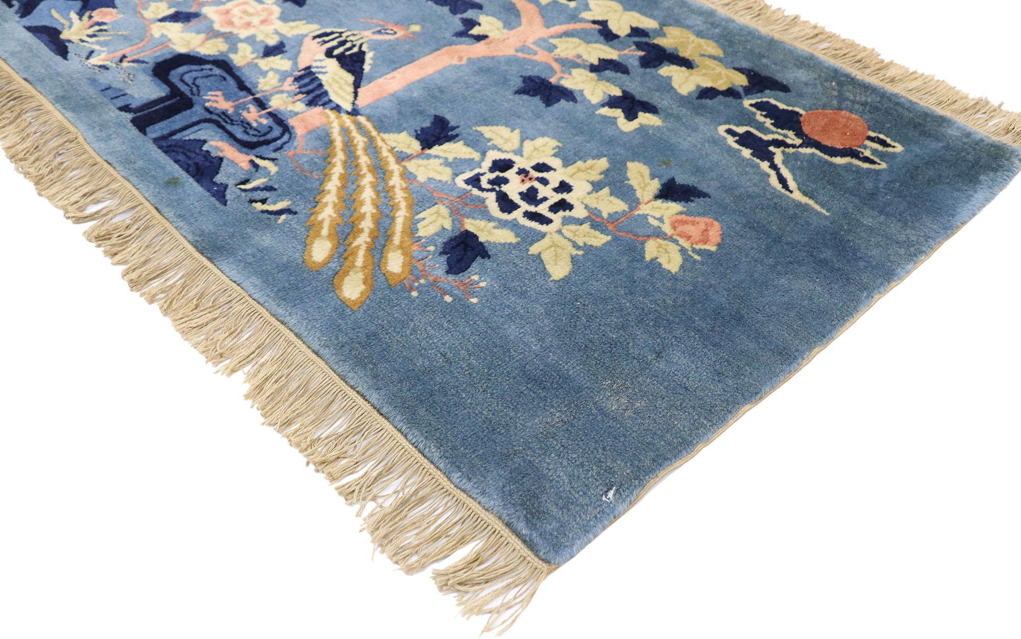 77585 Antique Chinese Art Deco Pictorial rug with Chinoiserie Chic Style 02'04 x 04'07. This hand knotted wool antique Chinese Baotou rug features a pictorial landscape scene with two phoenix birds set among a beautiful garden on a blue backdrop.