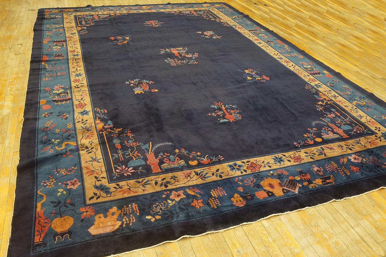 1920s Chinese Art Deco Carpet Navy background with blue border.
( 10' x 14'6'' - 305 x 442 )