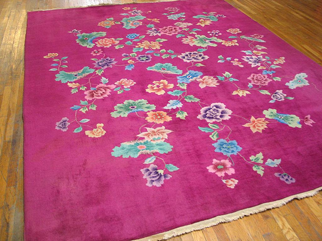 Antique rug deco with pink color and 9' 0'' x 11' 3'' size.