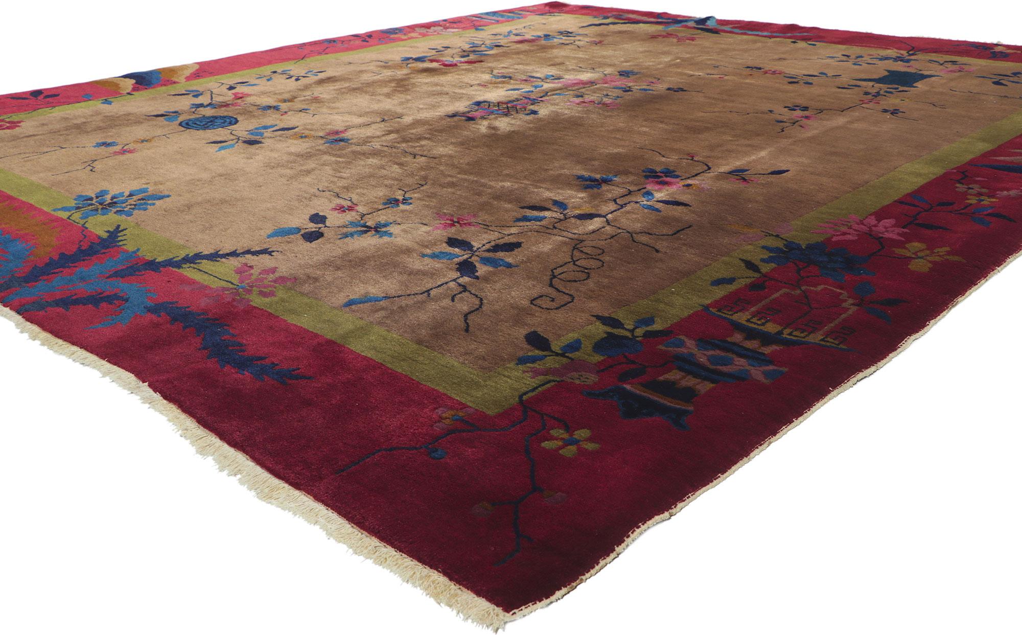 78303 Antique Chinese Art Deco Rug, 08'02 x 09'05. This hand knotted wool antique Chinese Art Deco rug features a color-blocked field and border scheme festooned with large, glorious sprays of flowers. Lotuses, peonies, chrysanthemums, and plum