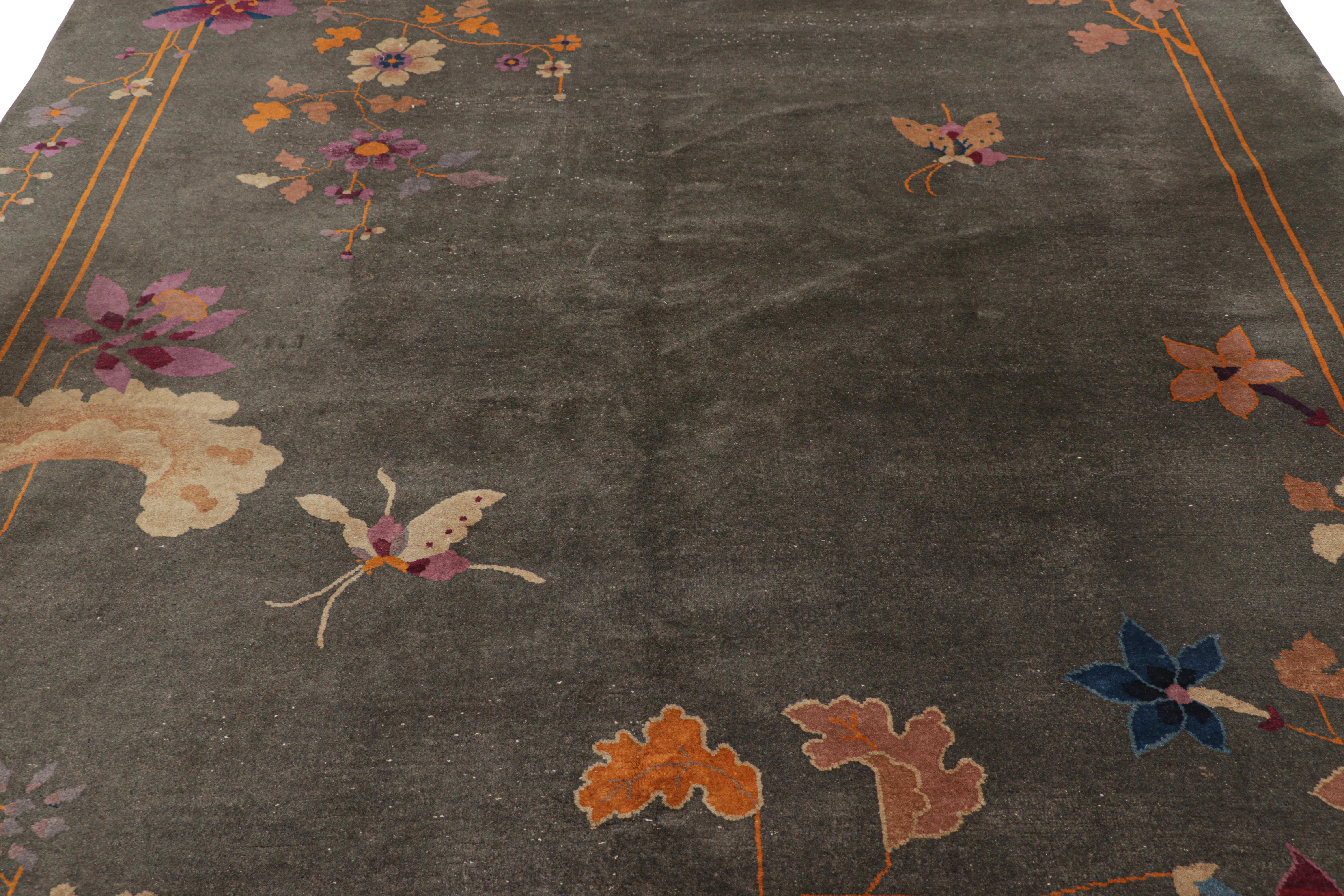 Hand-knotted in wool and originating from China circa 1920-1930, this 8x10 antique Chinese Art Deco rug is a rare collectible from the 1920s Chinoiserie style period pieces, and one of our new favorite curations.   

On the Design: 

A charcoal gray