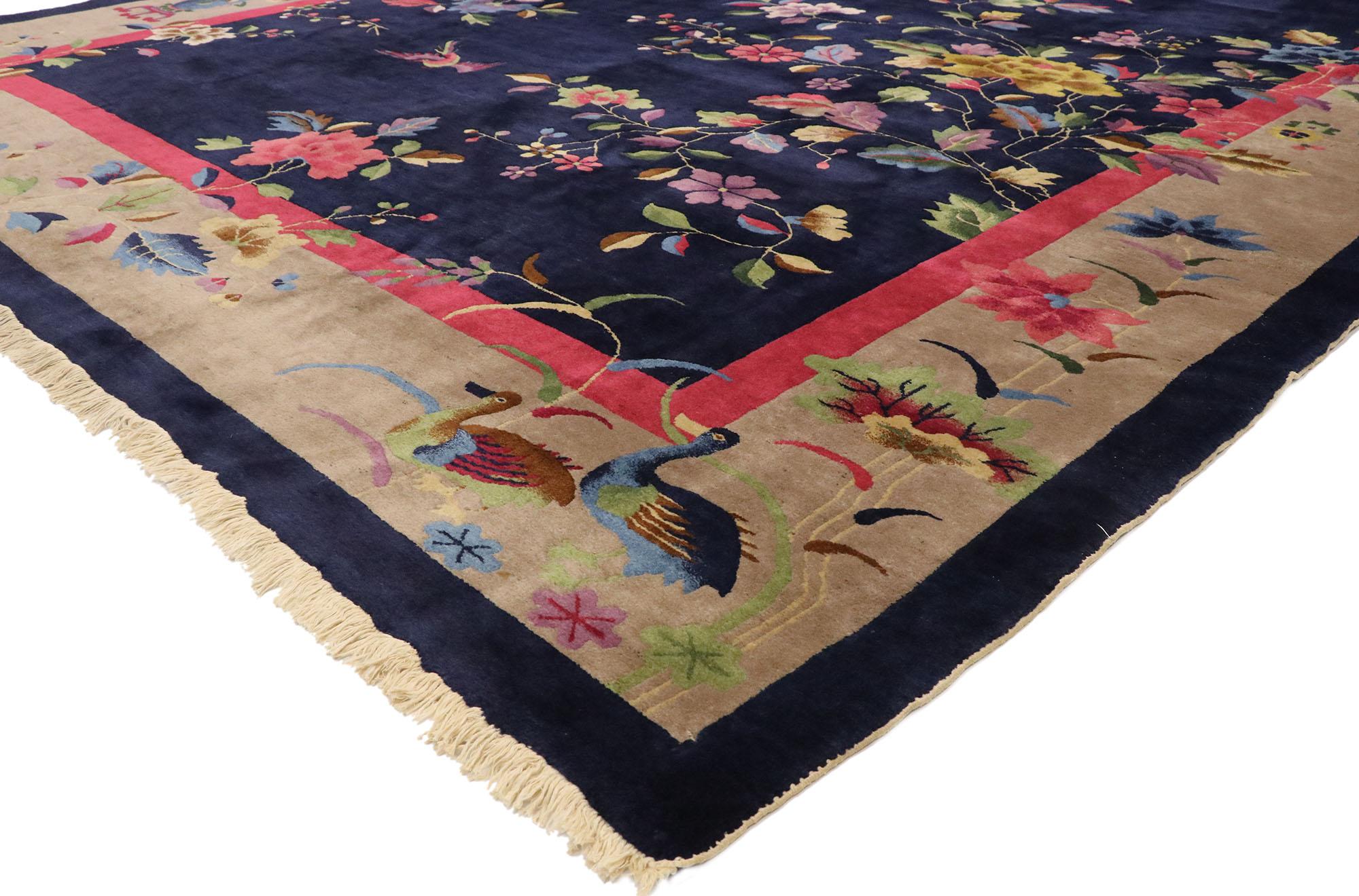 77452 antique Chinese Art Deco rug Inspired by Walter Nichols with Jazz Age style. This hand knotted wool antique Chinese Art Deco rug features elegant sprays of flowers interlaced with a variety of auspicious symbols overlaid upon an abrashed