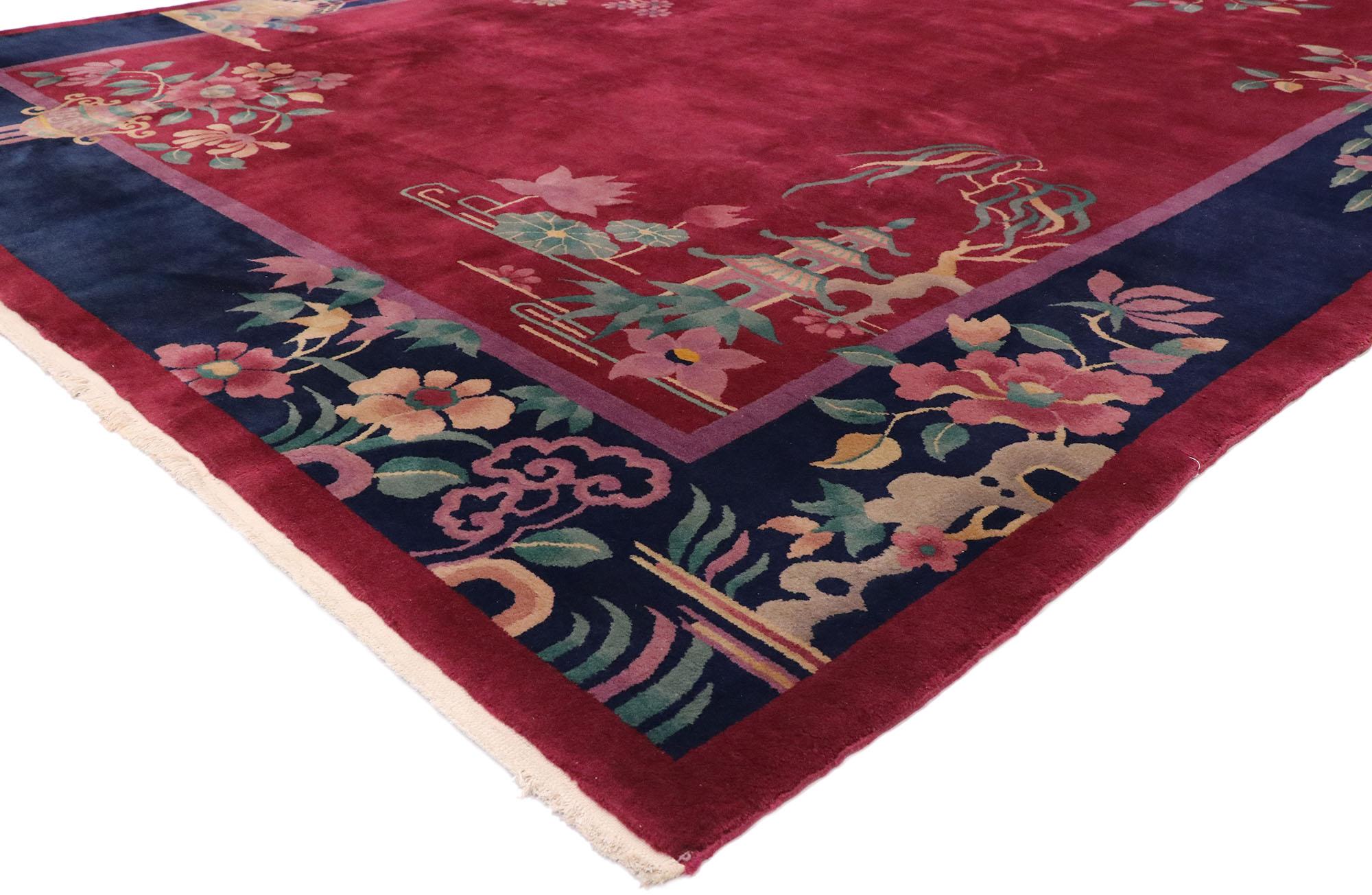 77450 antique Chinese Art Deco rug Inspired by Walter Nichols with Jazz Age style. This hand knotted wool antique Chinese Art Deco rug features a color-blocked field and border scheme festooned with large, glorious sprays of flowers. Lotuses,