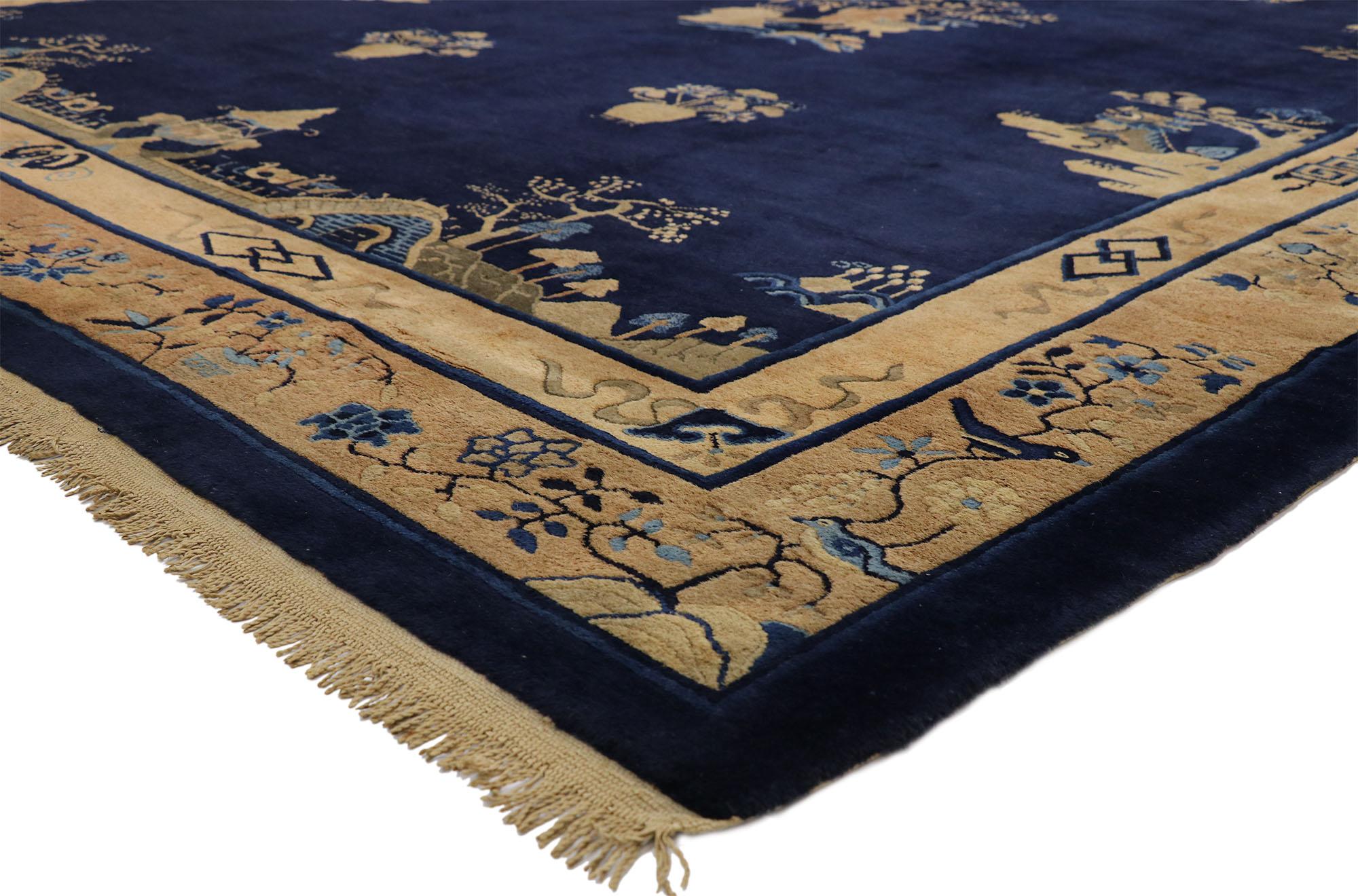 77375, antique Chinese Peking rug with landscape scenes and chinoiserie style. This hand knotted wool antique Chinese Peking rug features a variety of pictorial motifs floating on an abrashed ink blue field bookended by two landscape scenes. The