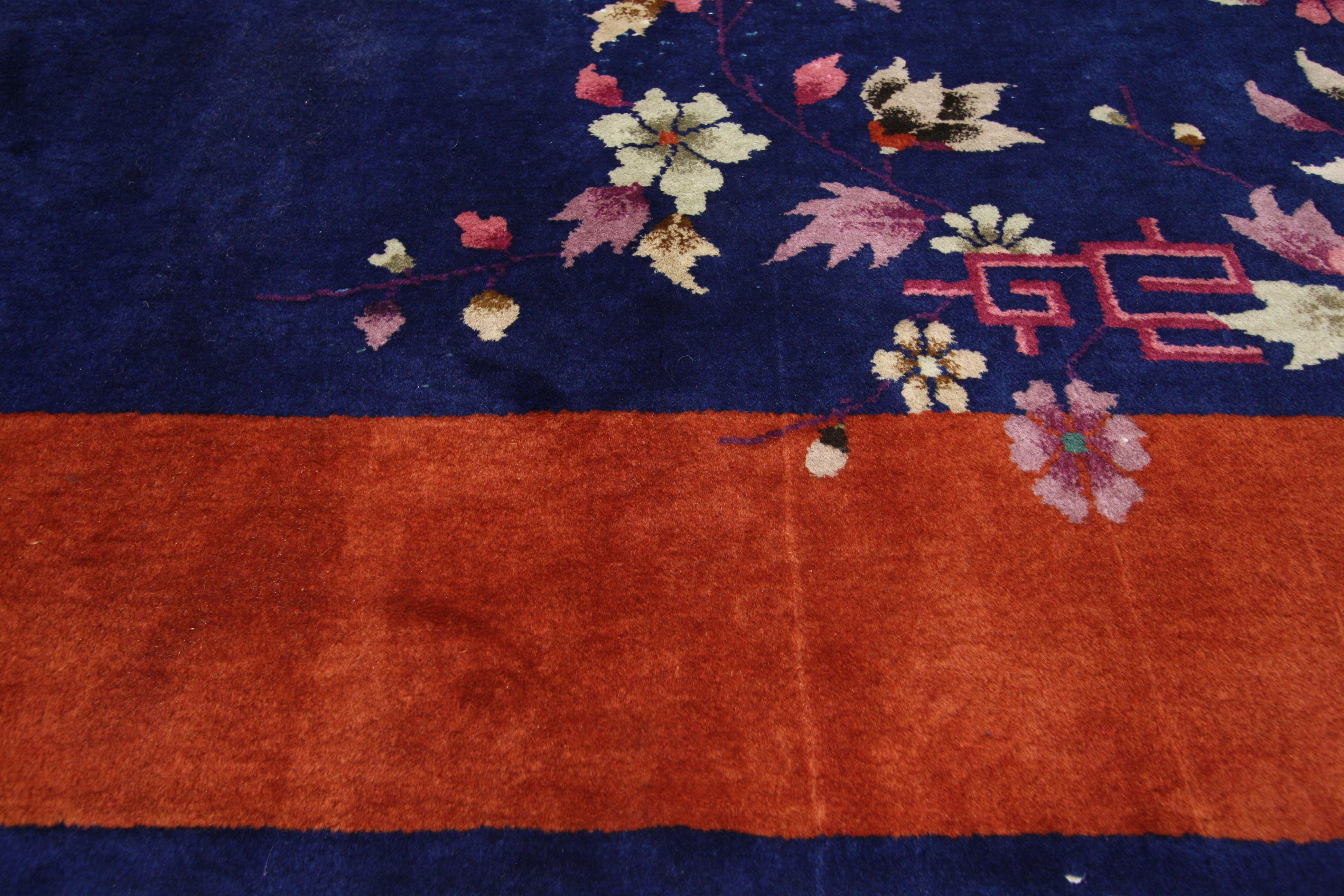 77177,Antique Chinese Art Deco Style Rug, Chinoiserie Chic Modern Asian Area Rug. This hand-knotted wool antique Chinese Art Deco style rug is a bright, dynamic chinoiserie chic rug with a deep blue field and terra cotta border broken by multicolor