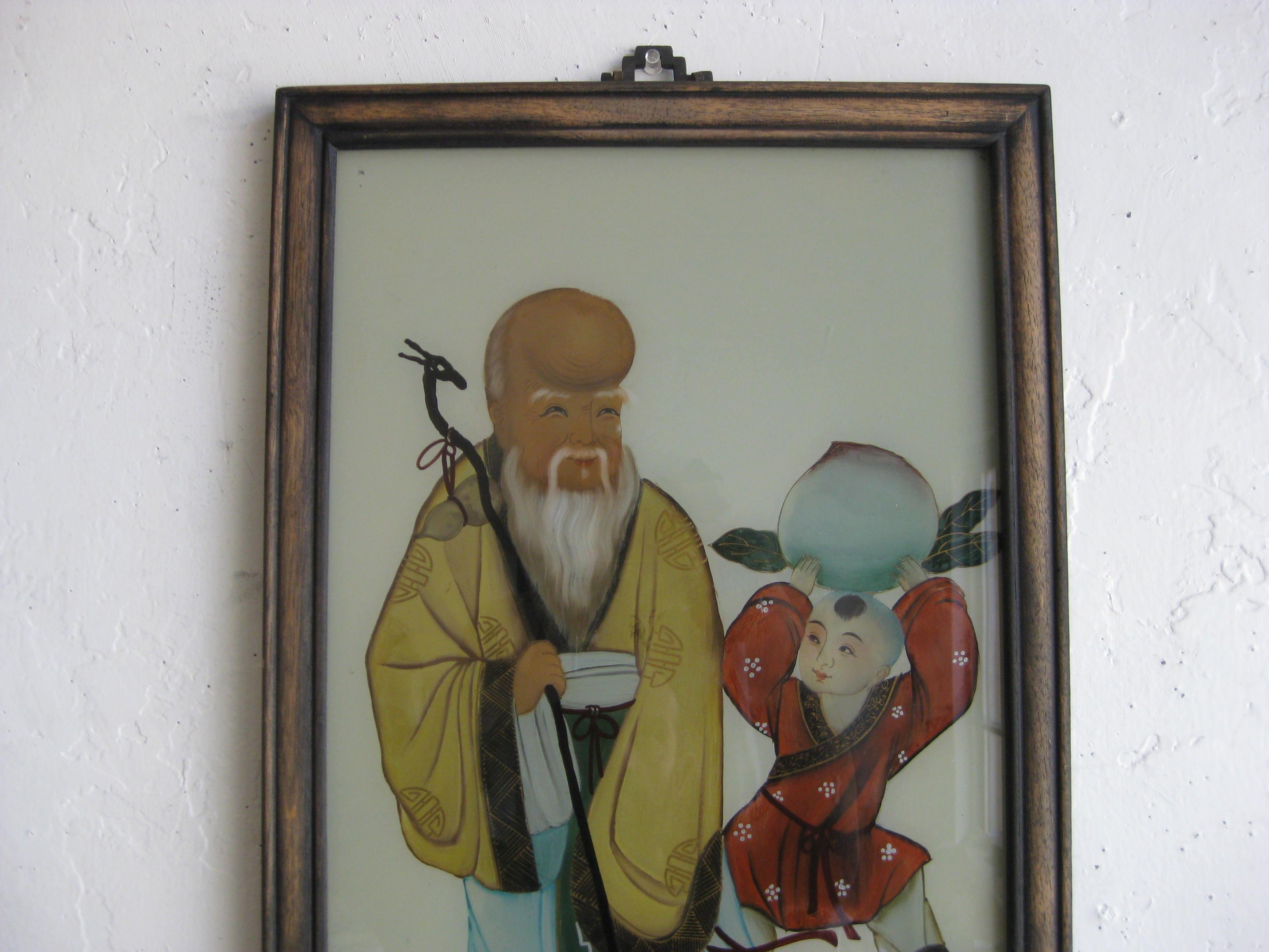 Antique Chinese hand painted reverse painting on glass. Features an Immortal and a boy holding a peach (A symbol of all things good). Great detail and color. Painting displays well and is in its original frame. In overall very nice original