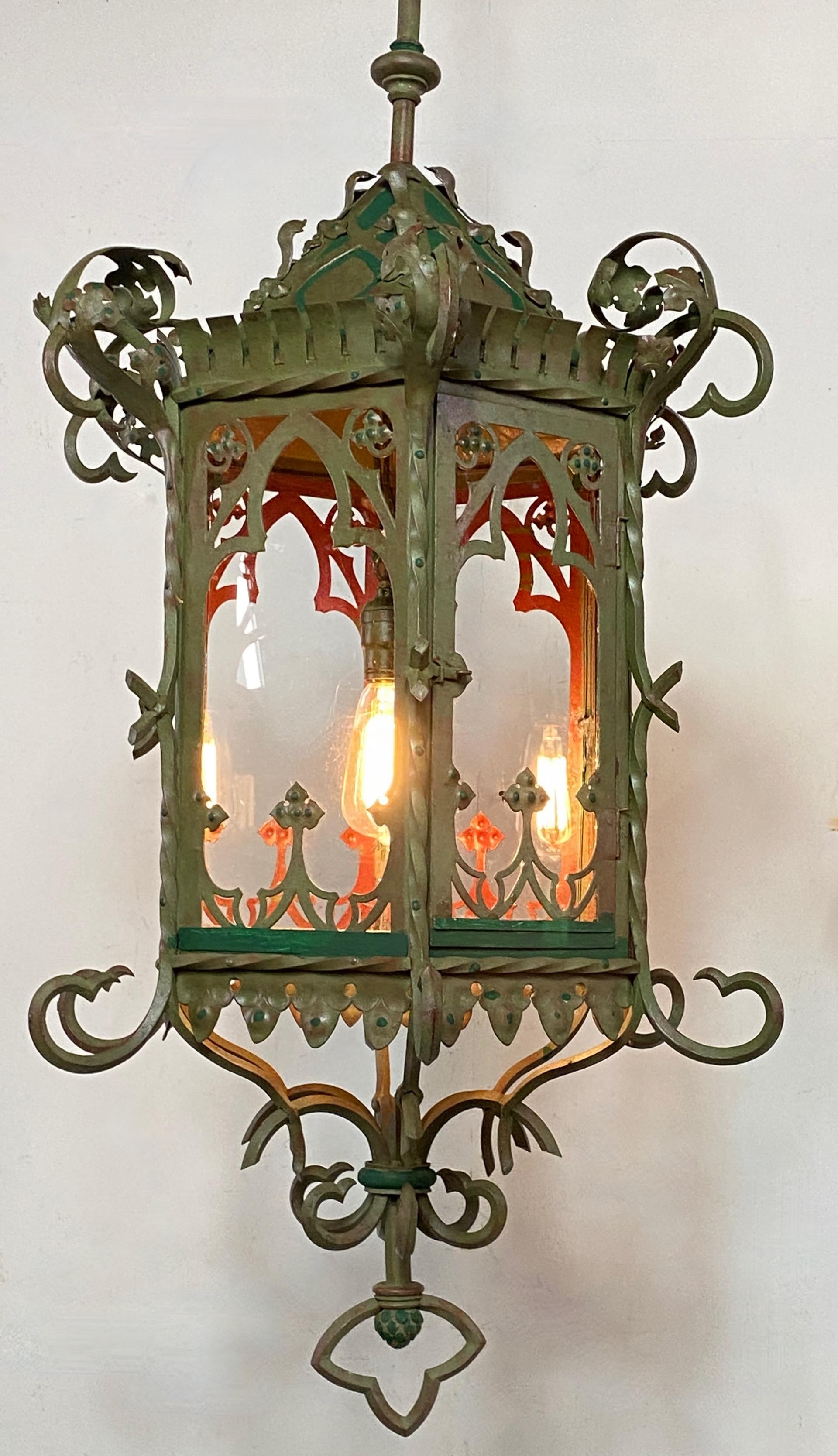 Highly unusual and excellent quality Asian inspired antique lantern. Wrought iron and steel with old green paint and glass panels. There is a hinged door that opens to replace light bulb.
Possibly this originally was a gas lantern.
Recently re-wired