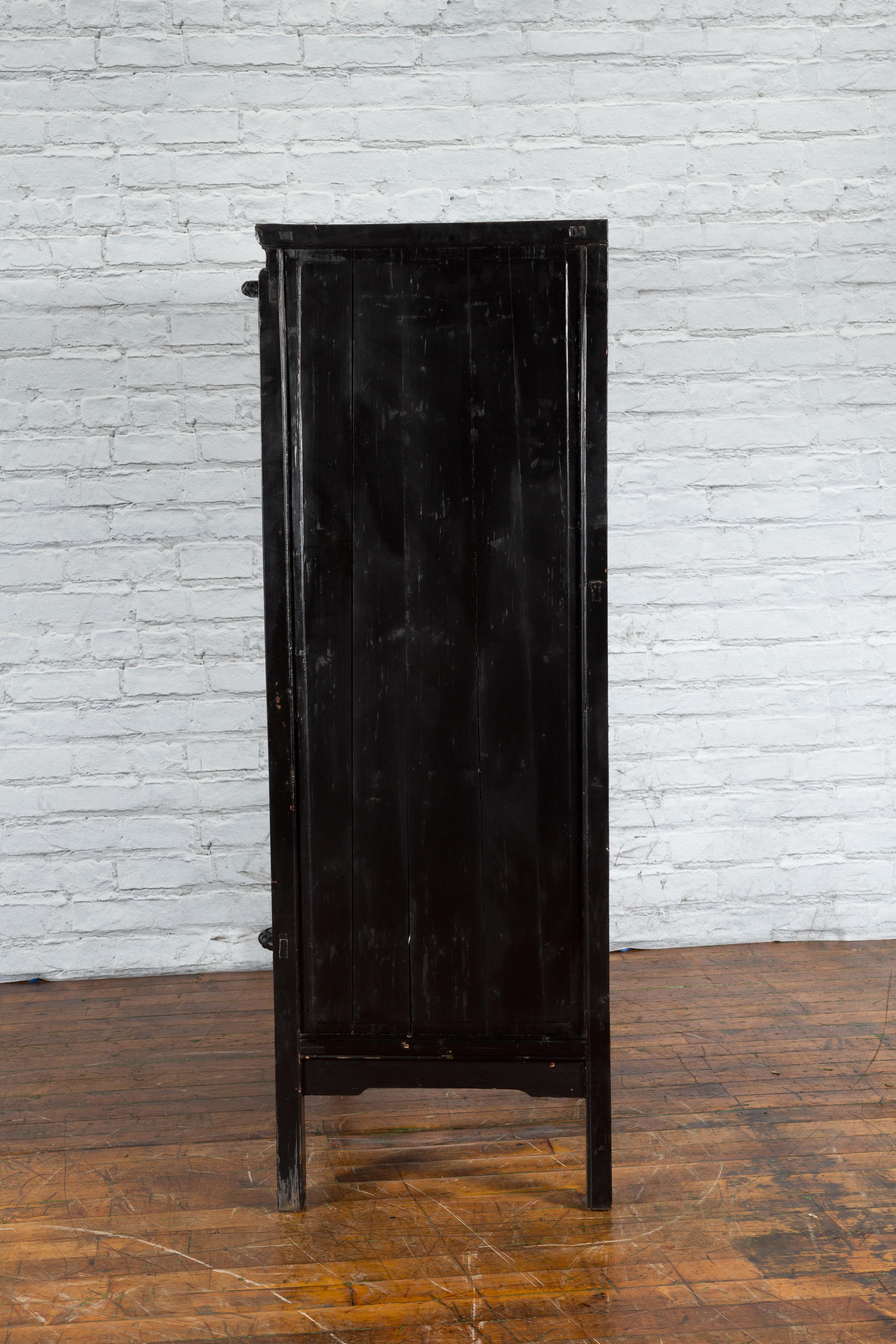 Antique Chinese Black Lacquer Wedding Cabinet with Oversized Brass Medallion For Sale 4