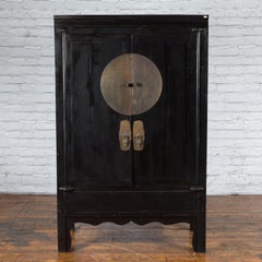 Antique Black Lacquer Wedding Cabinet with Oversized Brass Medallion