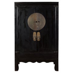 Antique Chinese Black Lacquer Wedding Cabinet with Oversized Brass Medallion
