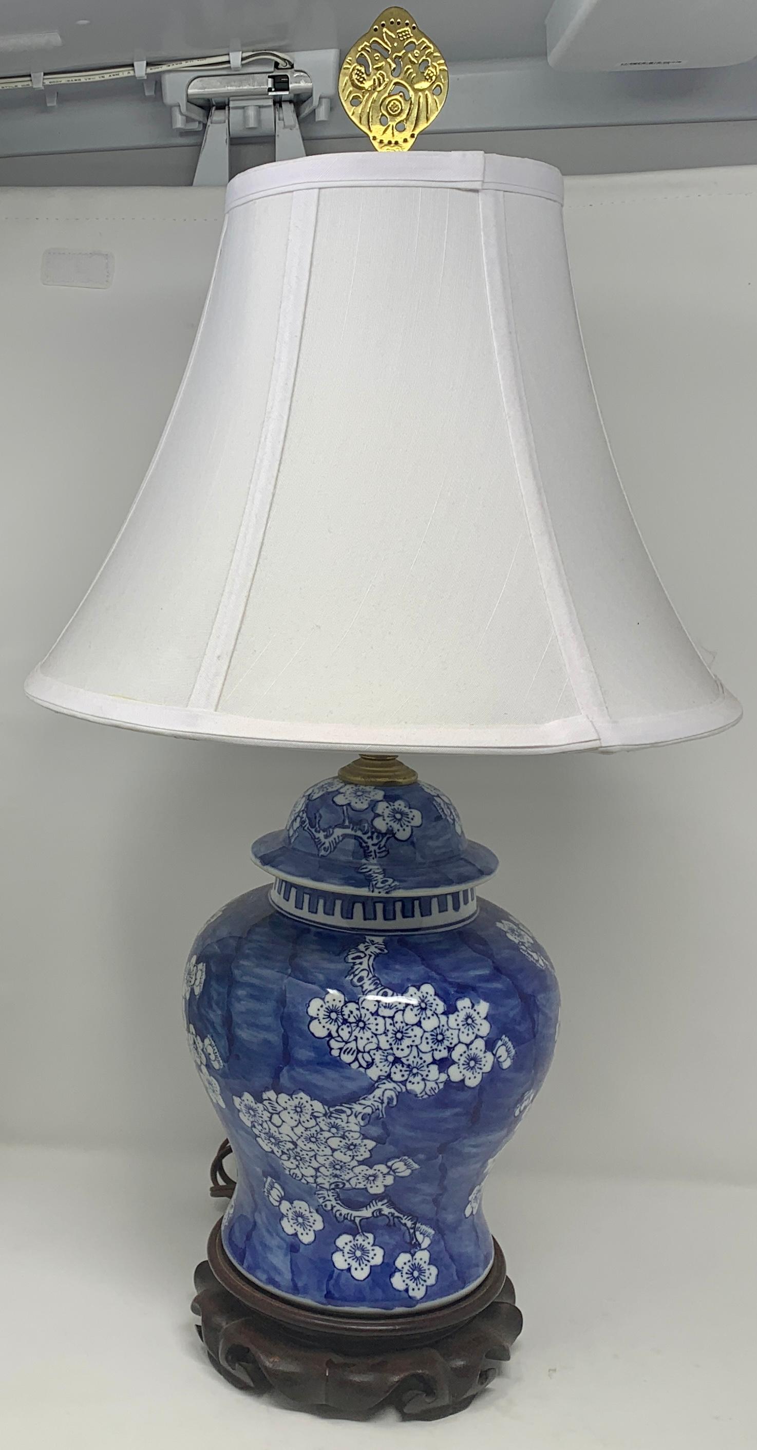Antique Chinese Blue and White Porcelain Urn Made Into a Lamp, circa 1910. 
1 of a Pair, Sold Individually.

Lamp Shade: 12 1/2 inches wide