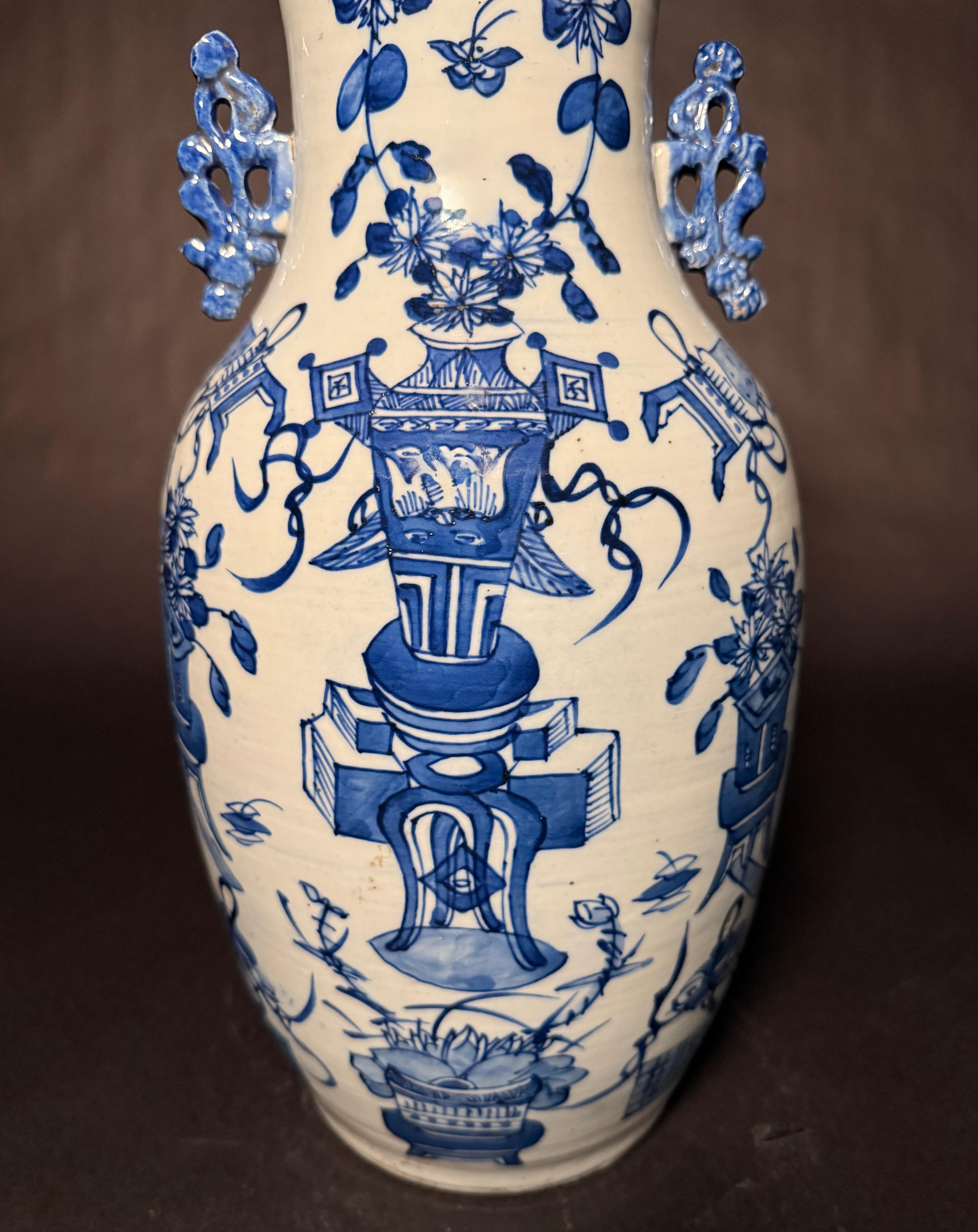 Hand-Painted Antique Chinese Blue And White Vase For Sale