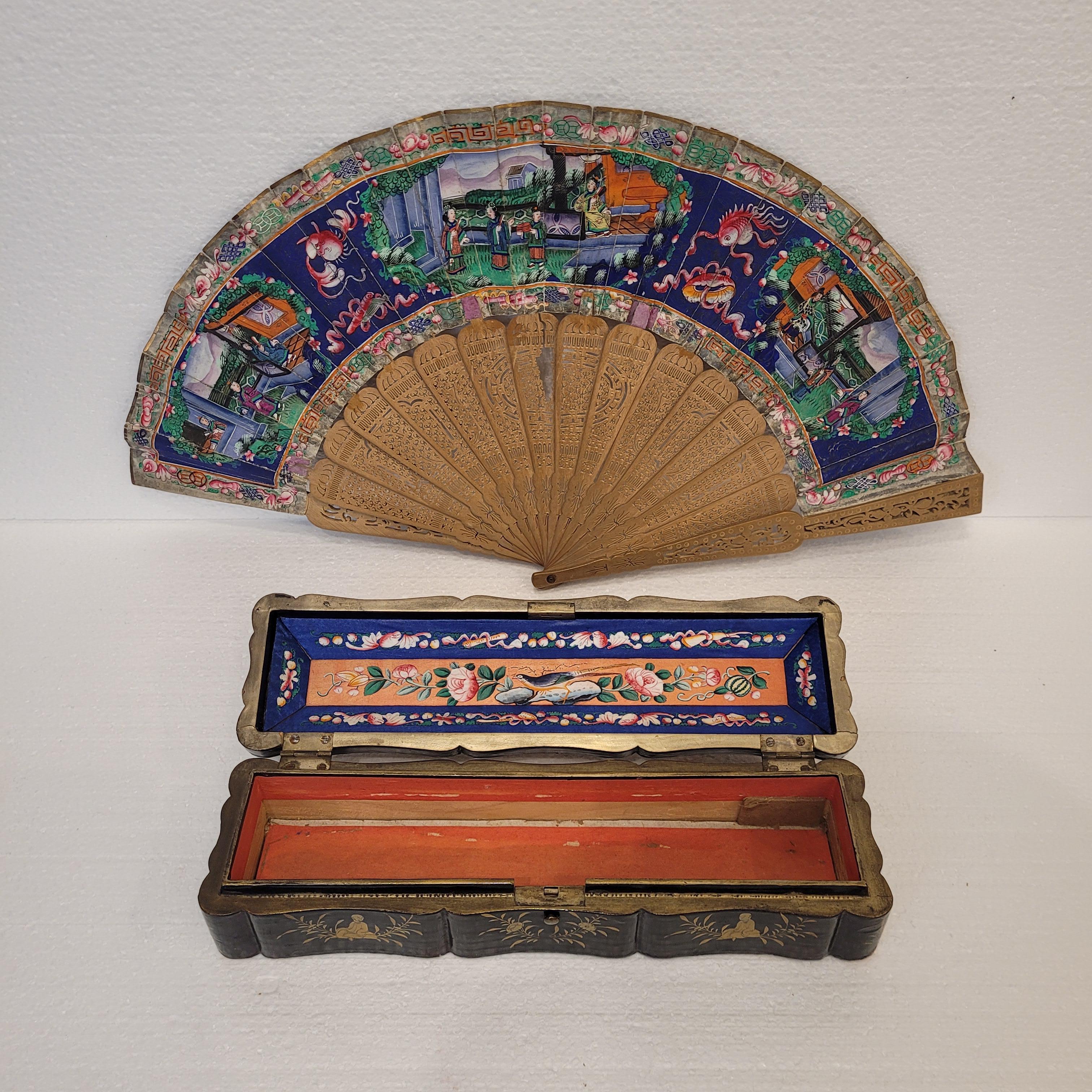 Femenino o masculino Antiguo abanico chino verde azulado llamado de las Mil Caras en venta