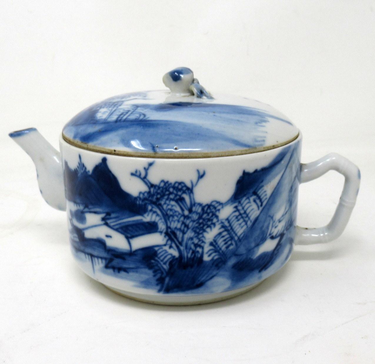 A very fine example of an early Chinese Export hand decorated blue and white porcelain teapot Jar of compact size, superbly decorated depicting an Oriental village scene, the finial cover with similar decoration. Circa 1800-1830. 

Together with an