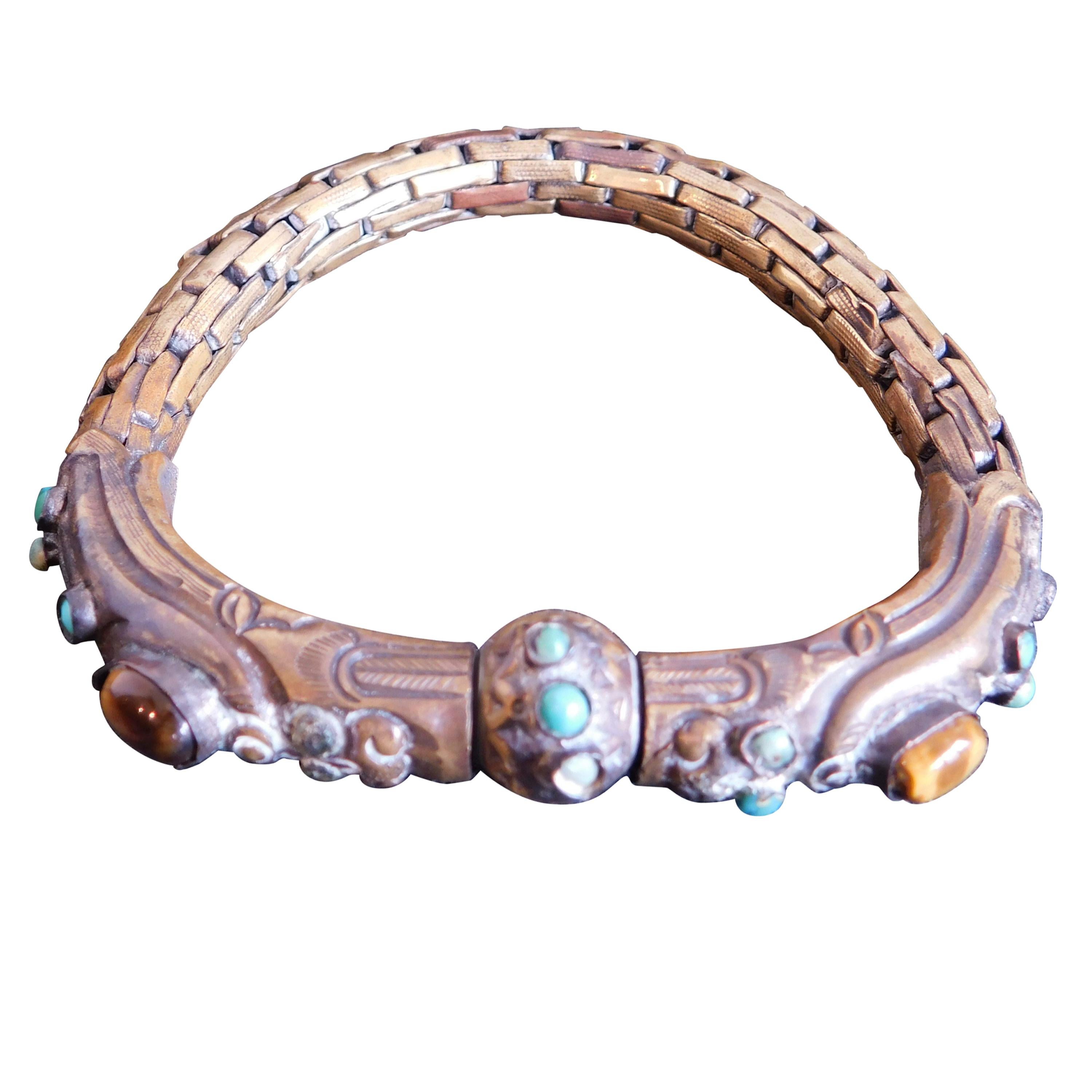 Antique Chinese Brass Bracelet with Turquoise and Tiger Eye Bezel Set Stones. For Sale