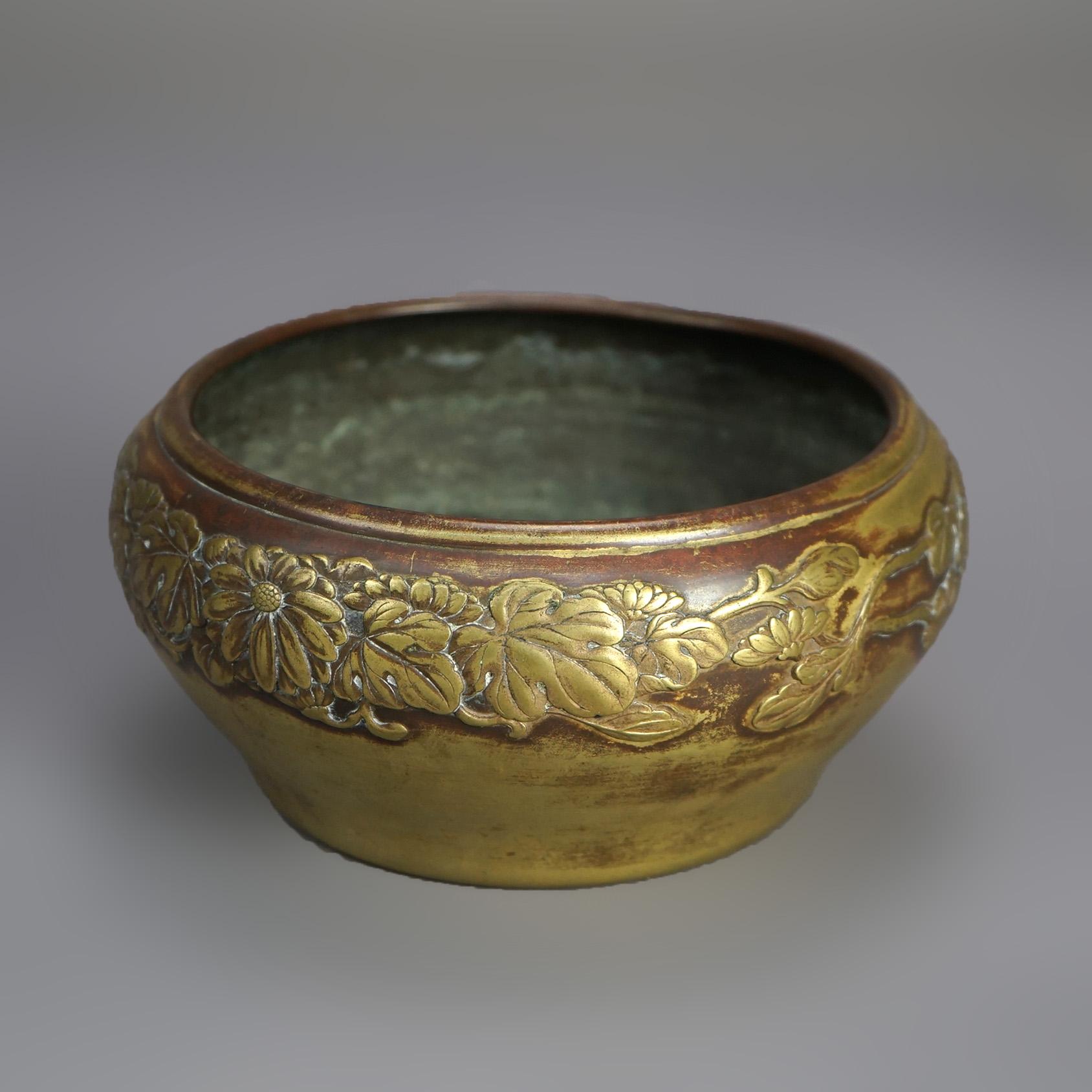 Antique Chinese Bronze Bowl with Embossed Floral Border, Stamped on base, 19thC

Measures- 3.5''H x 7.5''W x 7.5''D