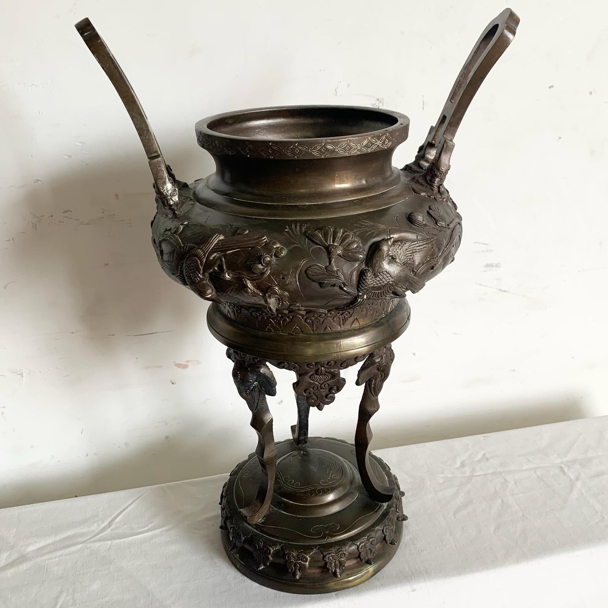 Introduce a piece of history to your decor with this antique Chinese bronze censer incense burner. Featuring intricate detailing and a rich bronze patina, this beautifully crafted piece is perfect for burning incense or as a decorative accent. Its