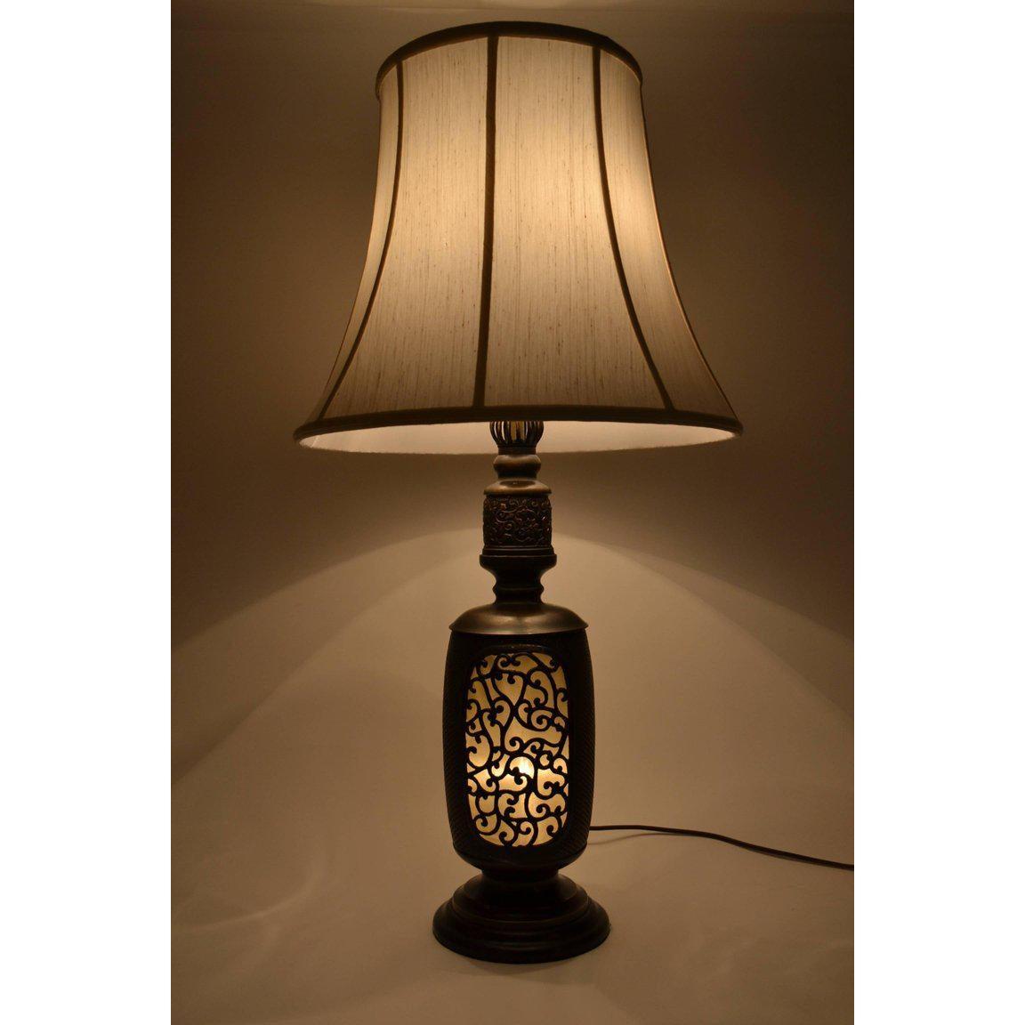 Antique Chinese bronze lantern lamp. The light emitting from the delicate tracery is soft and pleasing.
 