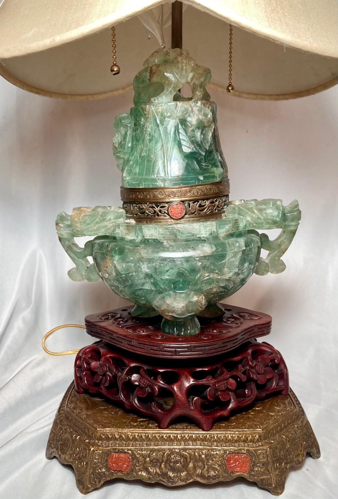 Antique Chinese bronze mounted carved jade quartz lamp with teakwood, Circa 1910.