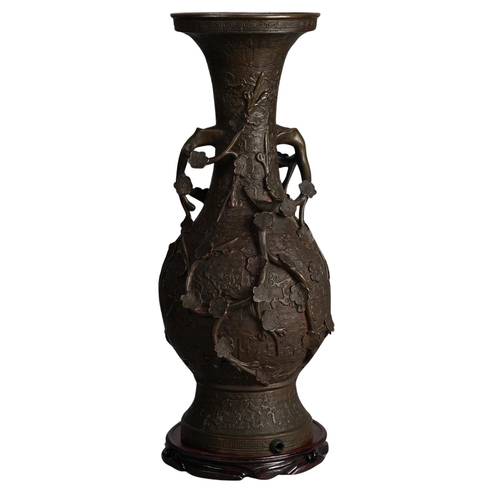 Antique Chinese Bronze Vase with Floral Decorations on Wooden Stand C1890 For Sale
