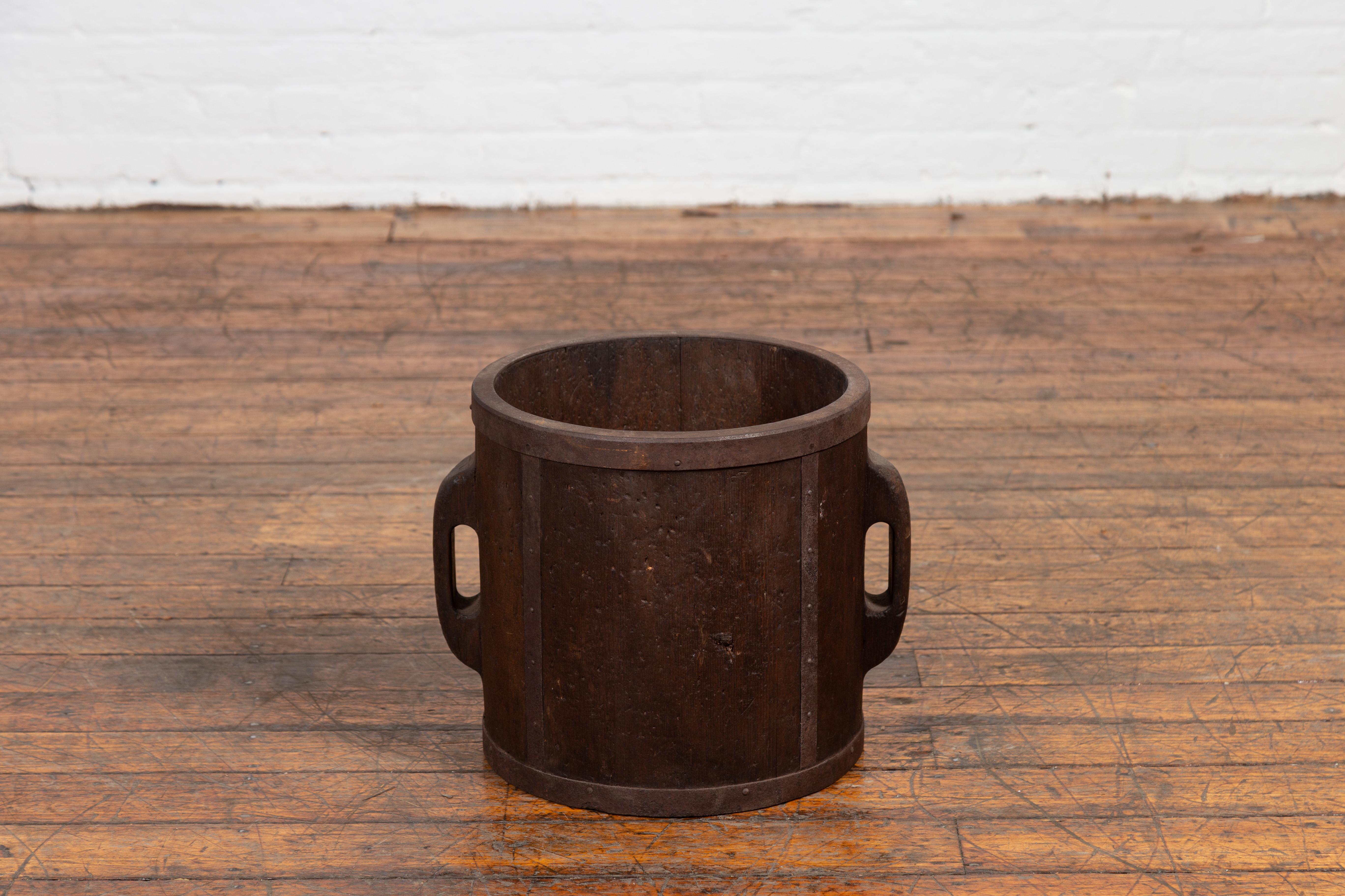 Wood Antique Chinese Brown Grain Measuring Cup with Metal Braces and Lateral Handles For Sale