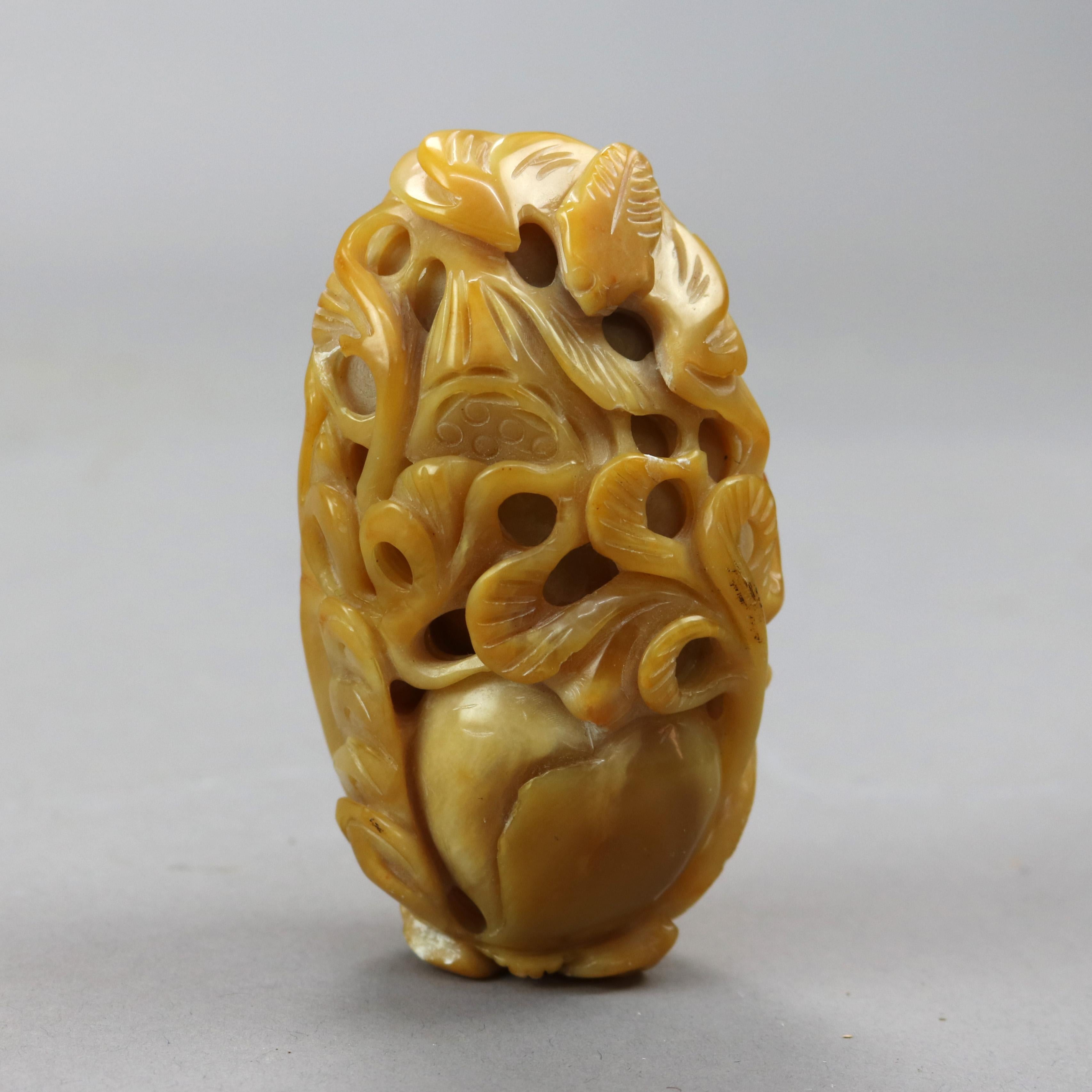 An antique Chinese abstract sculpture offers carved butterscotch jade in foliate form, drilled for hanging as photographed, damage as listed, 19th century

Measures - 4'' H x 3'' W x 1.5'' D.

Catalogue Note: Ask about DISCOUNTED DELIVERY RATES