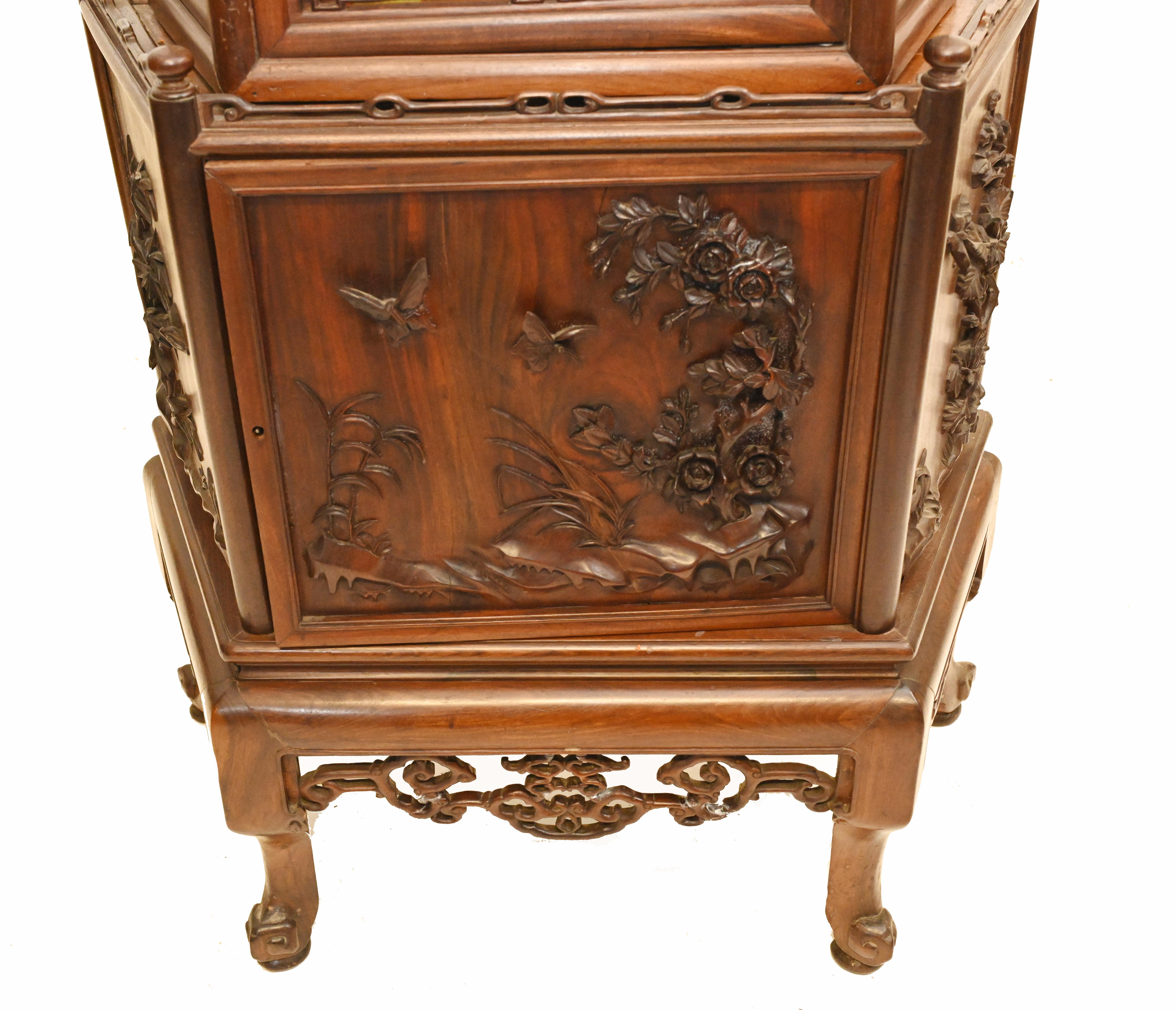 Gorgeous antique Chinese padauk hardwood display cabinet
Unusual work, our attention was initially drawn to the fact that the carving is deep relief from the solid wood and not applied
Great as a display cabinet or bookcase
Carved details are