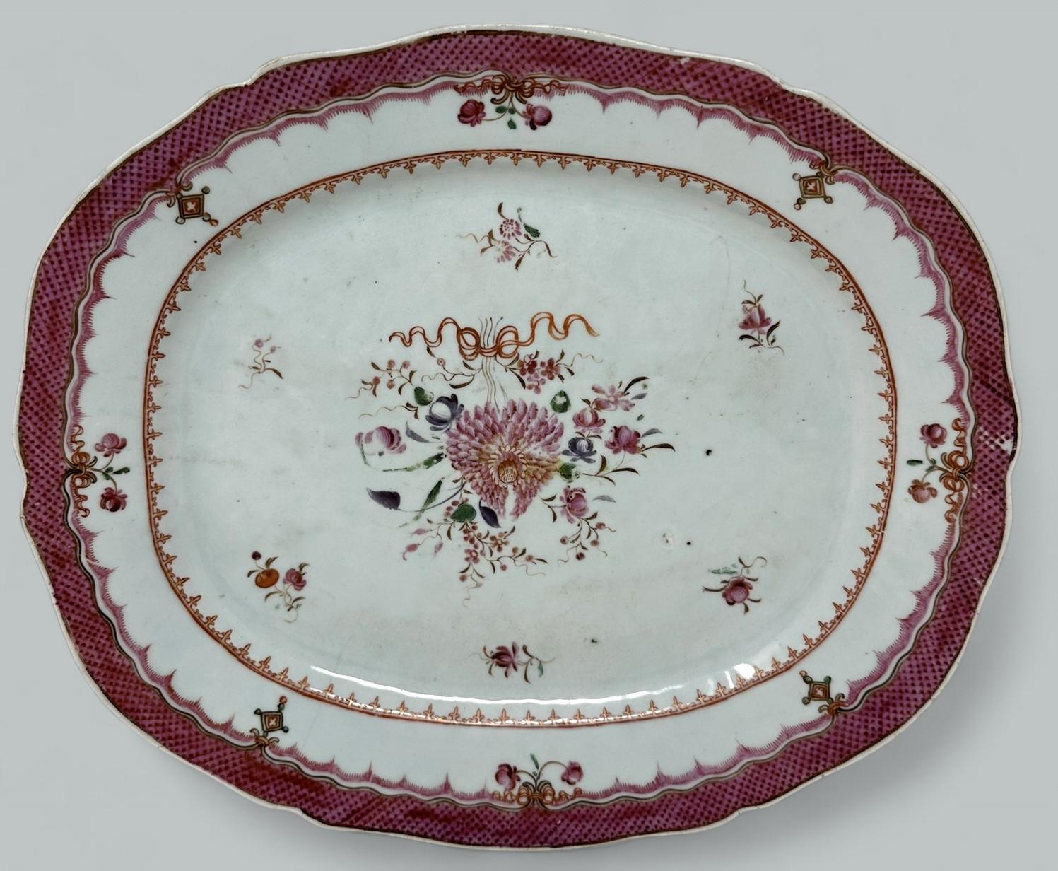 An Exceptionally fine example of a Heavy Gauge Chinese Quing Dynasty Porcelain Famille Rose Mandarin Cabinet Plate or Charger of rectangular form with shaped edges and of outstanding quality and impressive size.  

Hand decorated in brightly