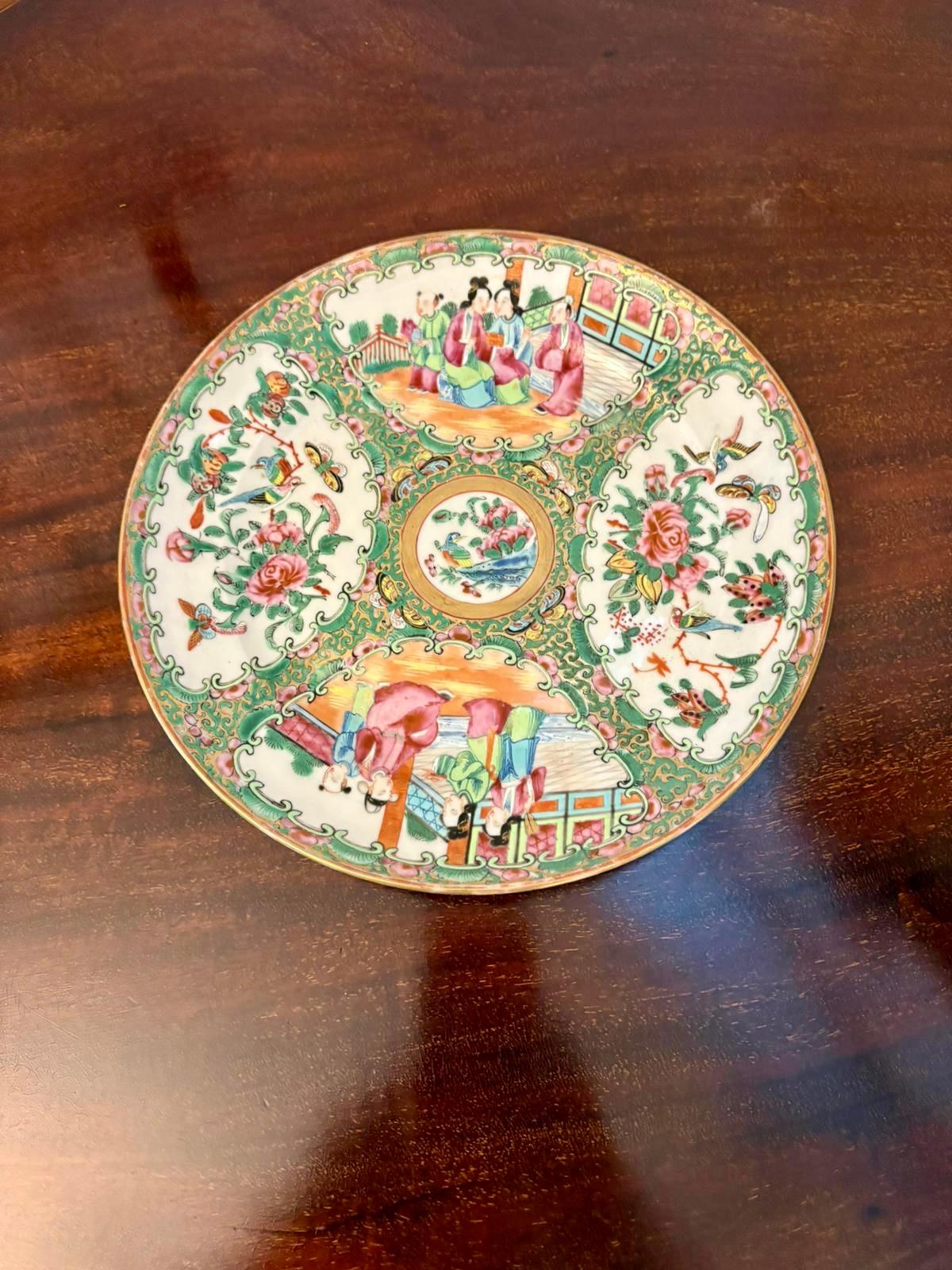 A finely painted Canton Rose Medallion plate decorated in the classic famille rose palette. The design is arranged in four alternating reserves: two featuring elegant courtly figures in pavilion settings and two filled with richly detailed birds,