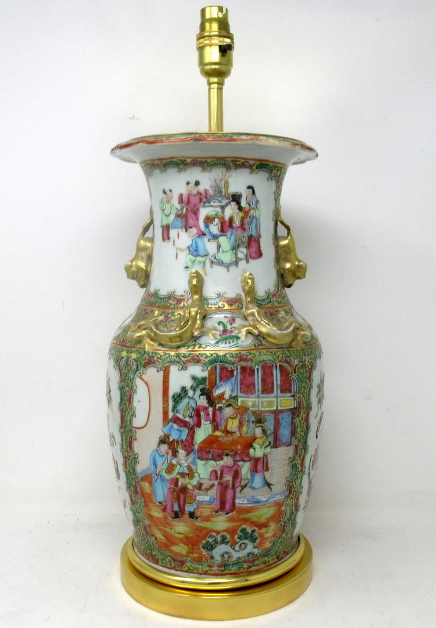 An exceptionally Fine example of a Cantonese Hand Decorated Chinese Export Porcelain Vase of seldom seen large proportions no converted to an Electric Table Lamp, with its later heavy gauge circular ormolu base, mid Nineteenth Century. 

The main