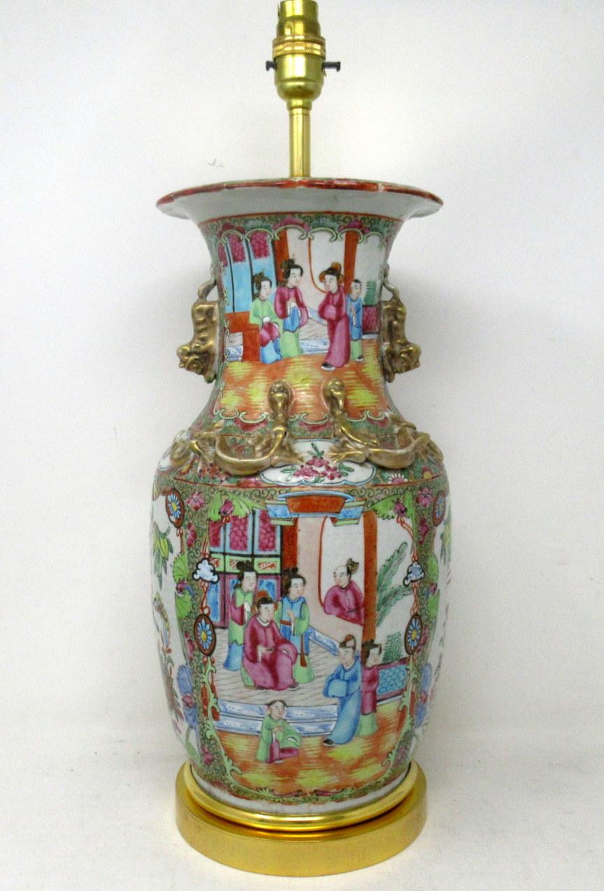 An exceptionally fine example of a Cantonese Hand Decorated Chinese Export Porcelain Vase of seldom seen large proportions no converted to an Electric Table Lamp, with its later heavy gauge circular ormolu base, mid Nineteenth Century. 

The main