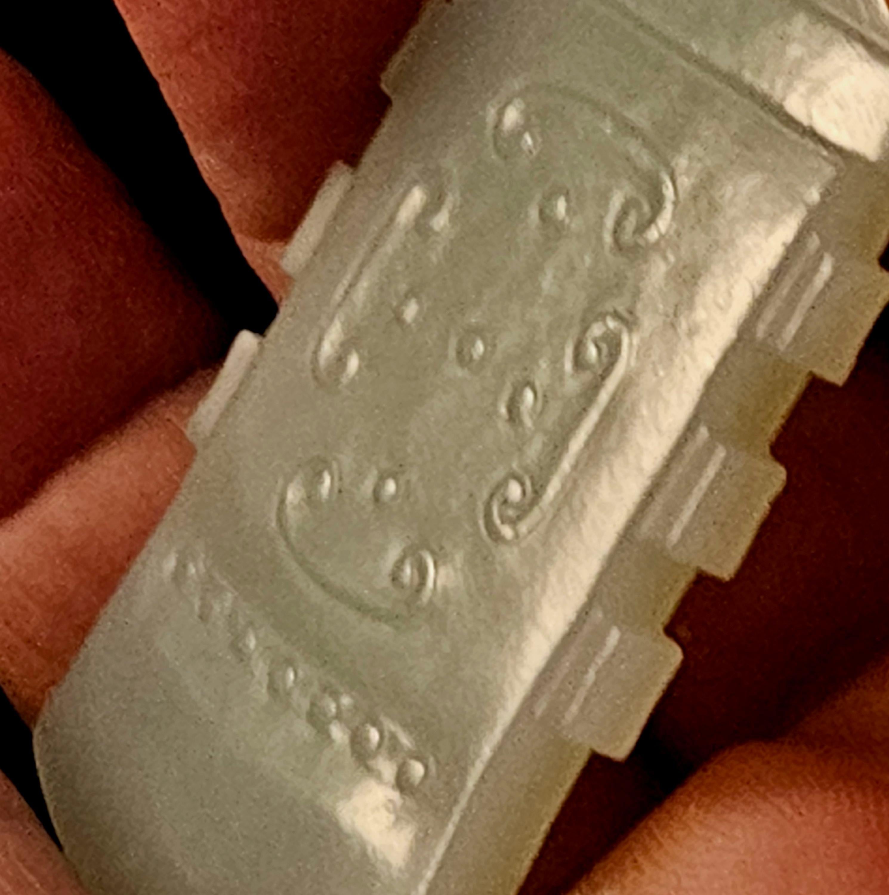 Antique Chinese Carved Celadon axe shaped Jade Pendant, 19th Century. 

-Dimensions and Density-

Jade:
Width: 1.5