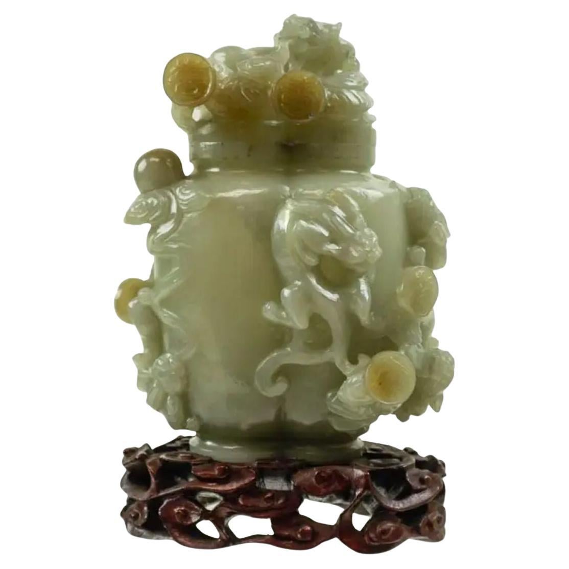 Antique Chinese Carved Celadon Jade Vase with Dragons on Wood Stand For Sale