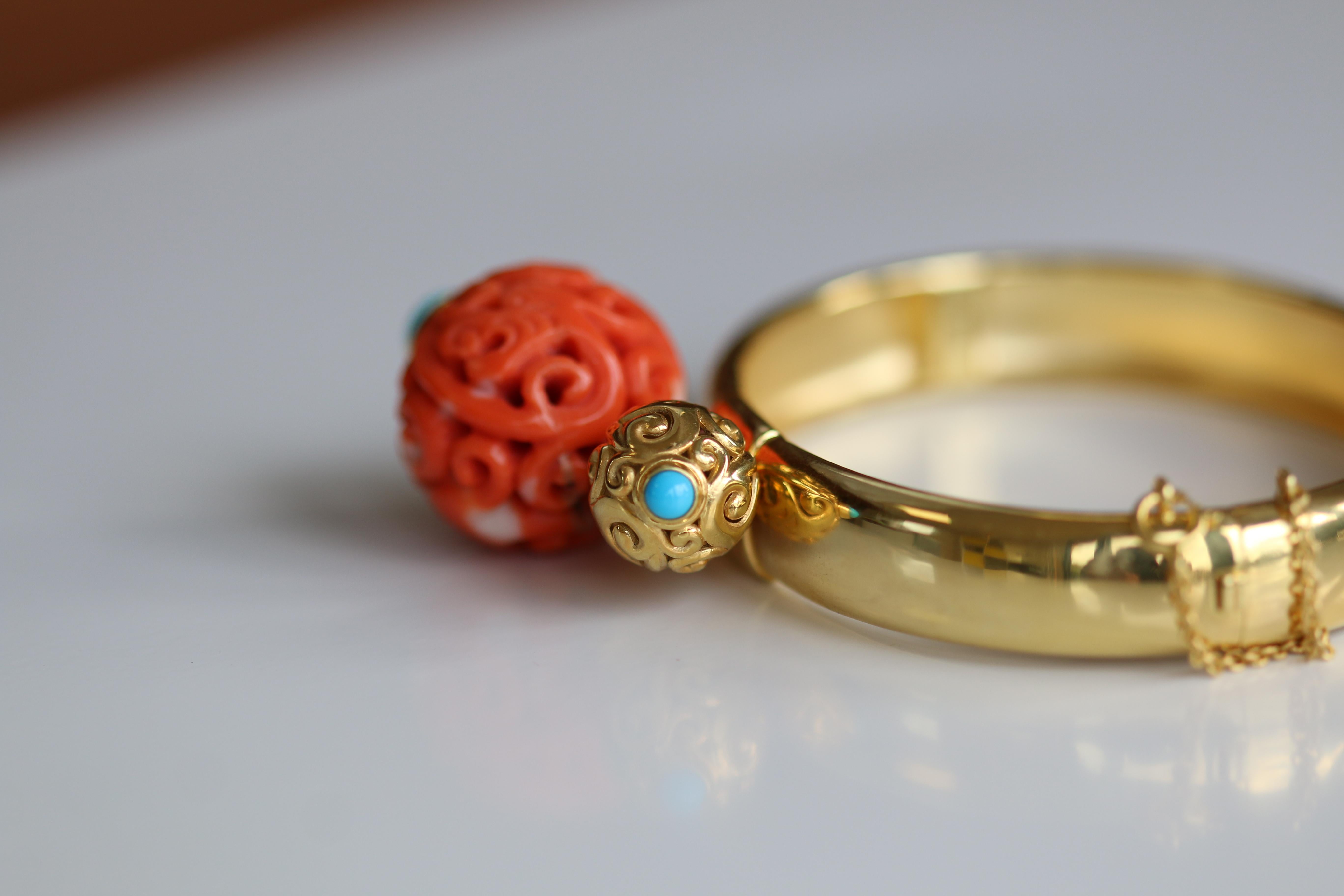 Women's Antique Chinese Carved Coral Bead on a Gold Bangle