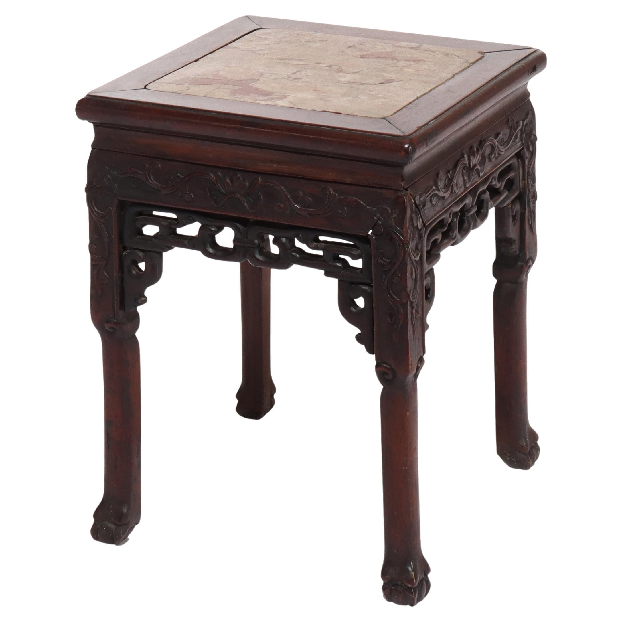 Antigua mesa china con tablero de mármol rojo tallado en madera dura C1920