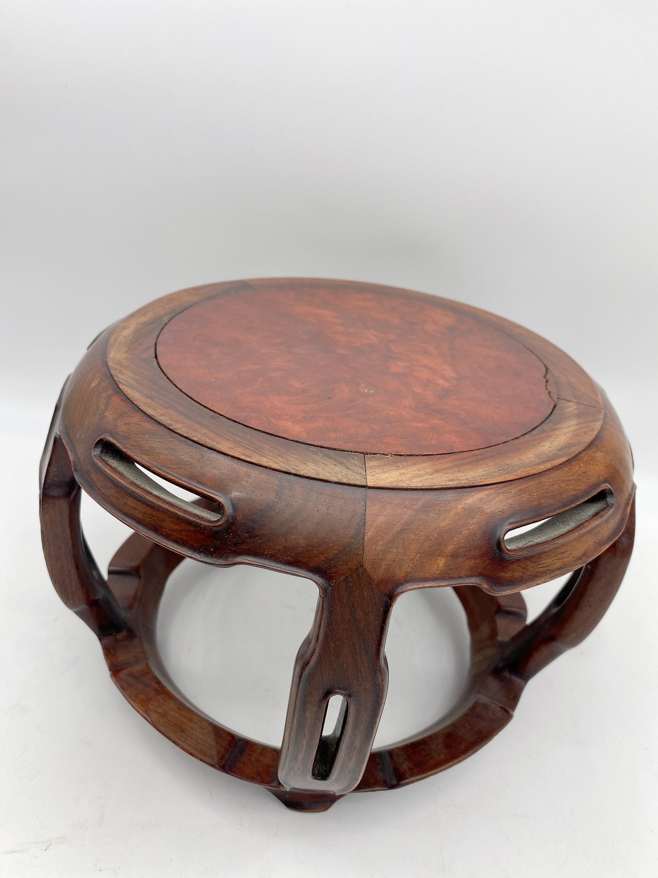 A antique Chinese heavily carved hardwood circular stand with burl wood top insert, over carved hardwood and unique 4 legs, see more pictures, measures: 9