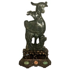 Antica figura di giada cinese intagliata di una fenice, "Libertà, vita eterna".