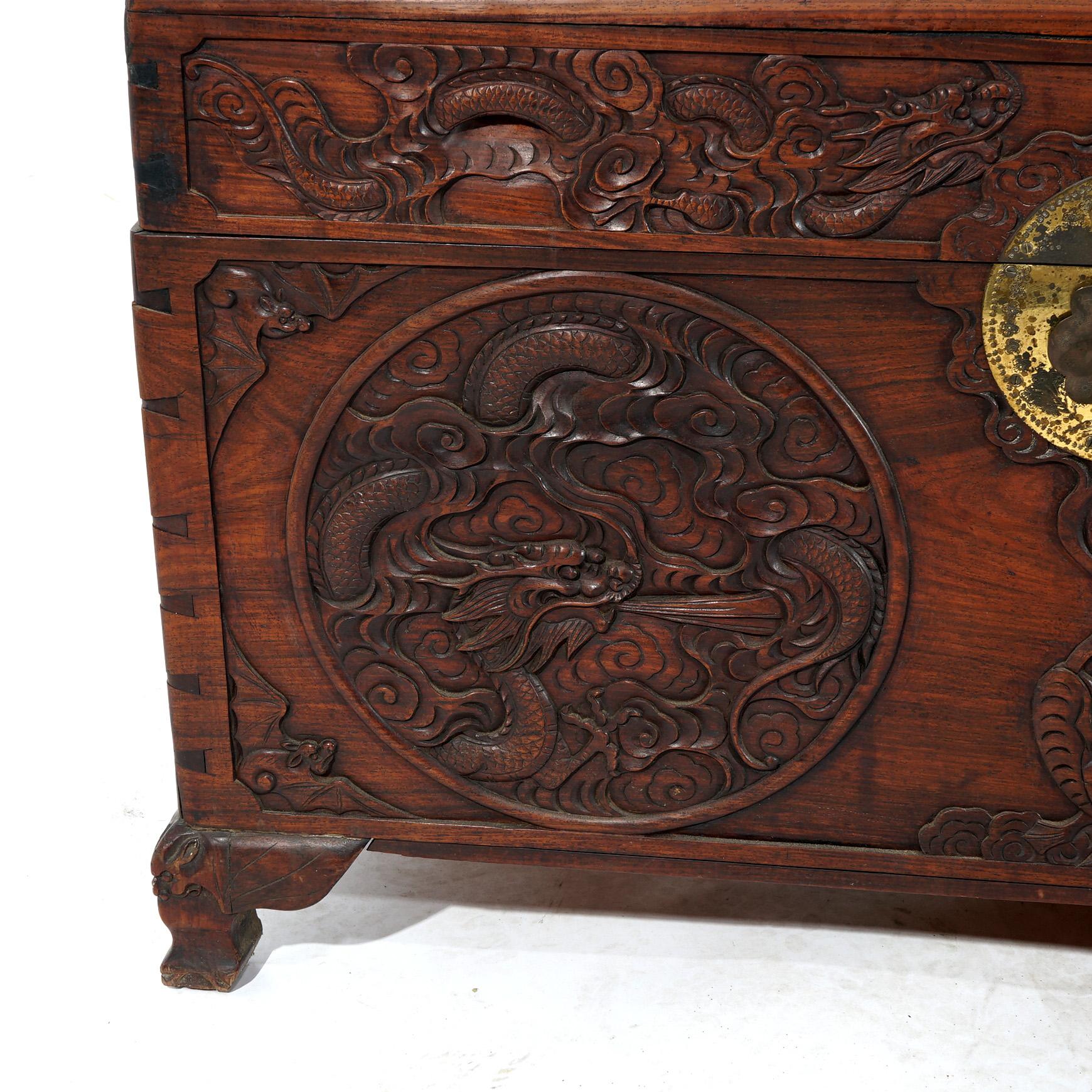***Ask About Reduced In-House Delivery Rates - Reliable Professional Service & Fully Insured***
Antique Chinese Carved Rosewood Blanket Chest or Wedding Truck with Dragon Scene in Relief and Brass Hardware, Raised on Stylized Cabriole Legs,