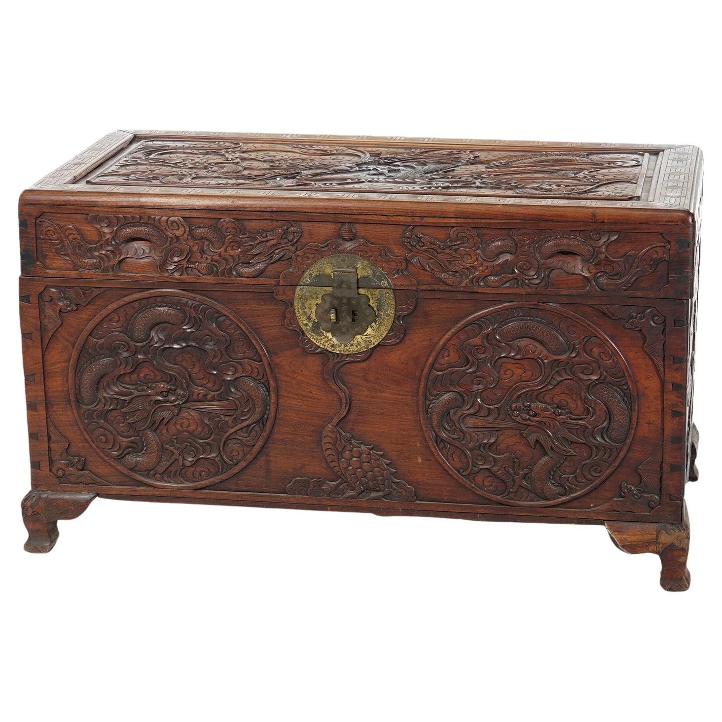 Antique Chinese Carved Rosewood Blanket Chest with Dragon Scene in  Relief 19thC For Sale