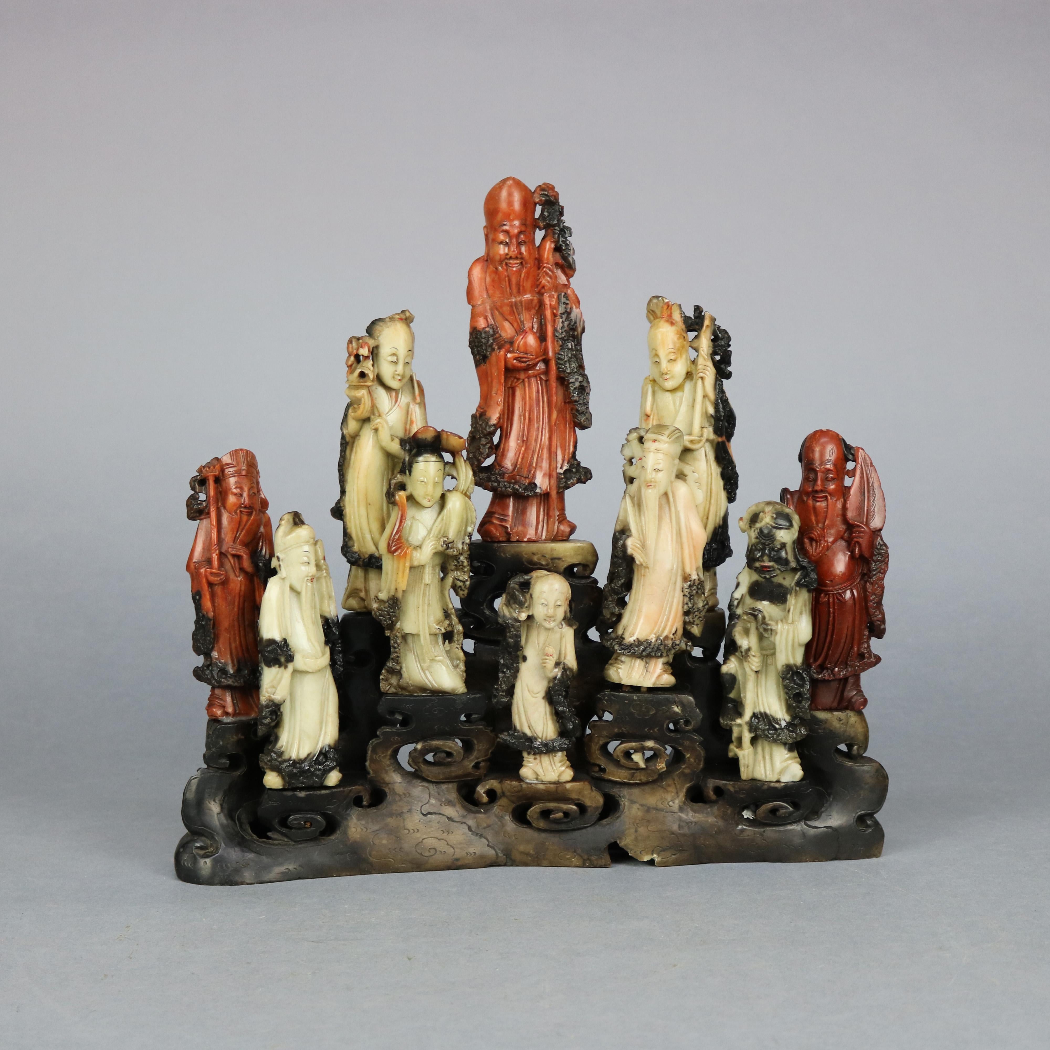 An antique Chinese grouping offers carved soapstone depicting ten scholar immortals, c1890
no label
Measures: Largest: 7.5